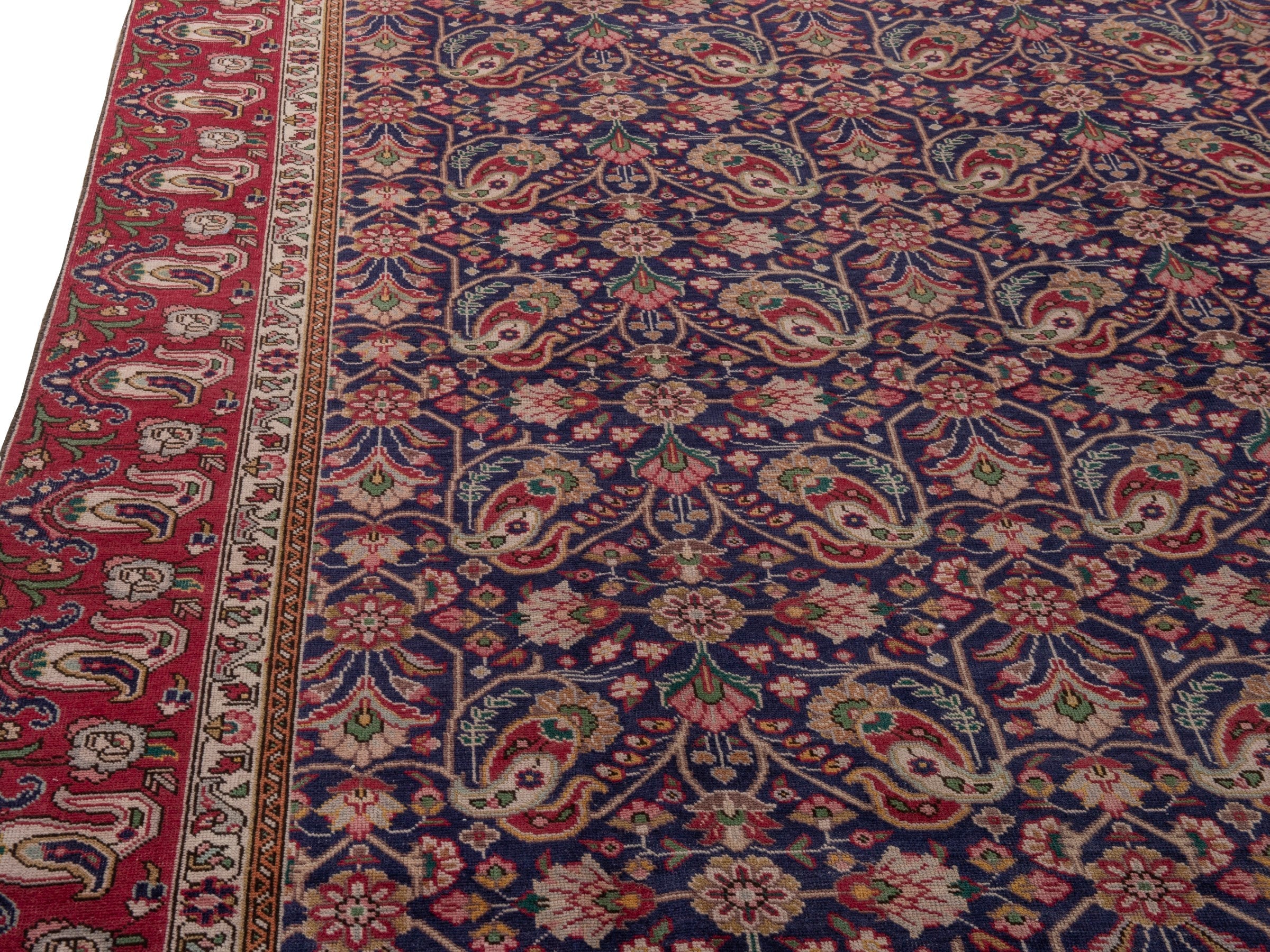 Persian Tabriz oversized rug in navy and burgundy, view 6 of 17