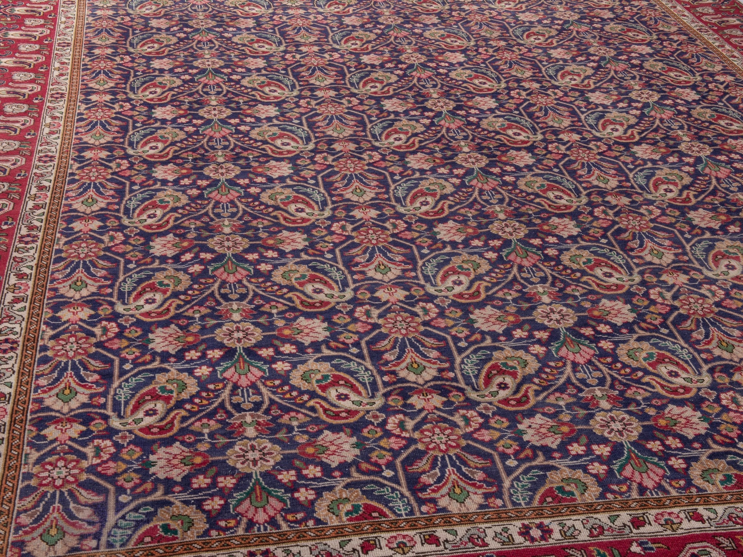 Persian Tabriz oversized rug in navy and burgundy, view 7 of 17