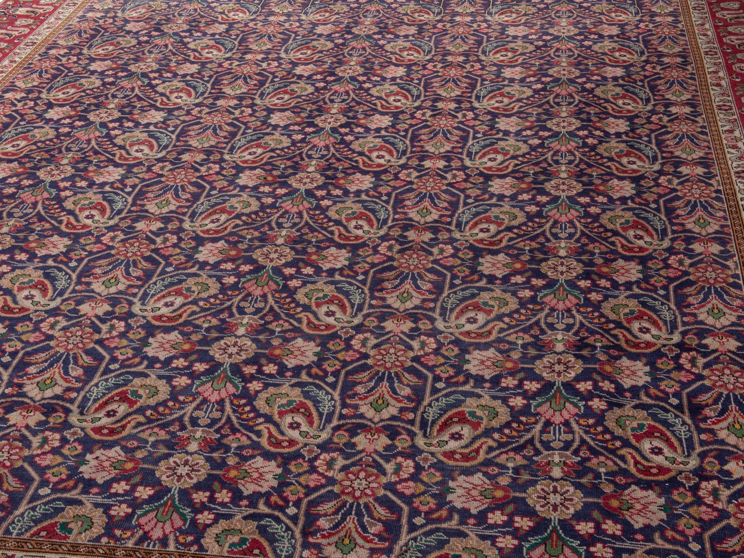 Persian Tabriz oversized rug in navy and burgundy, view 8 of 17