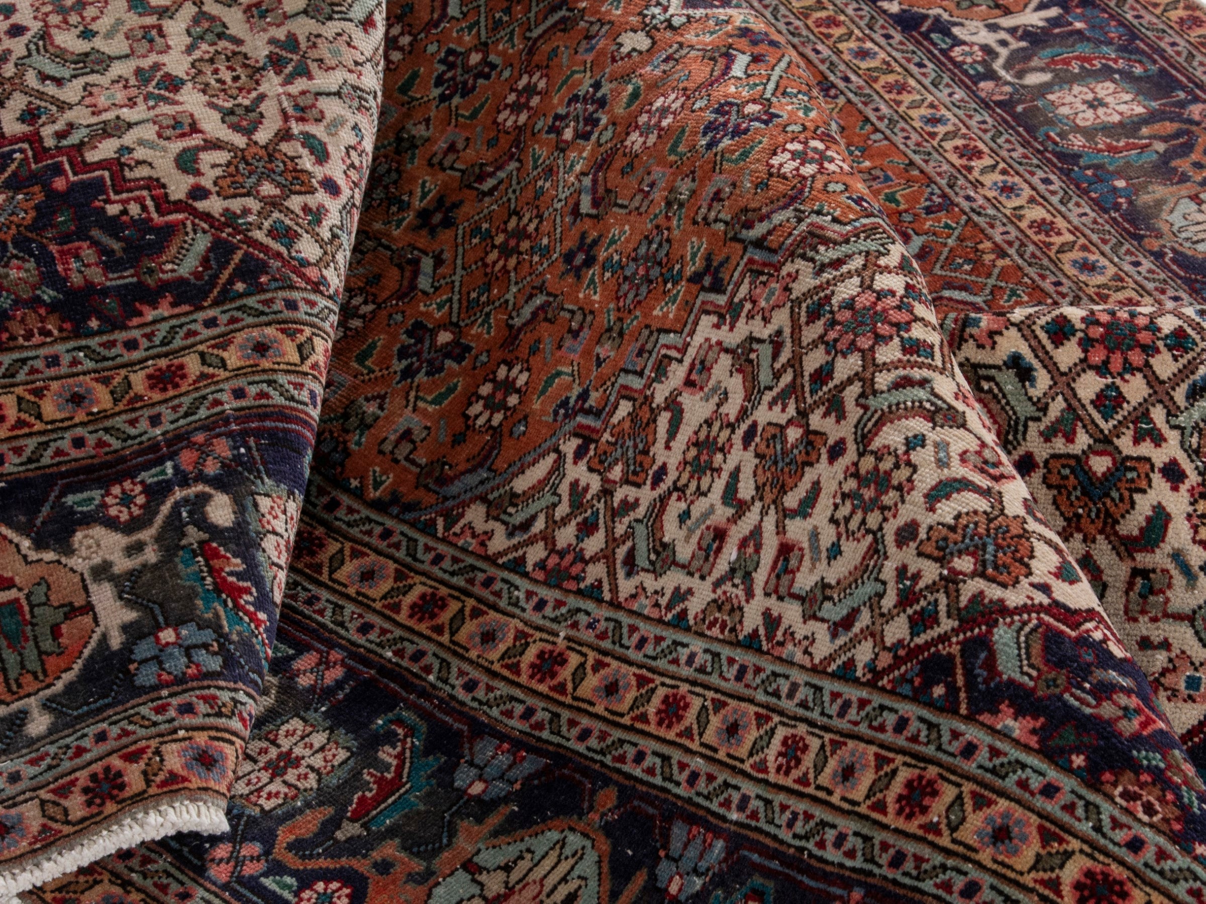 Persian Tabriz oversized rug in rust and navy, view 18 of 21