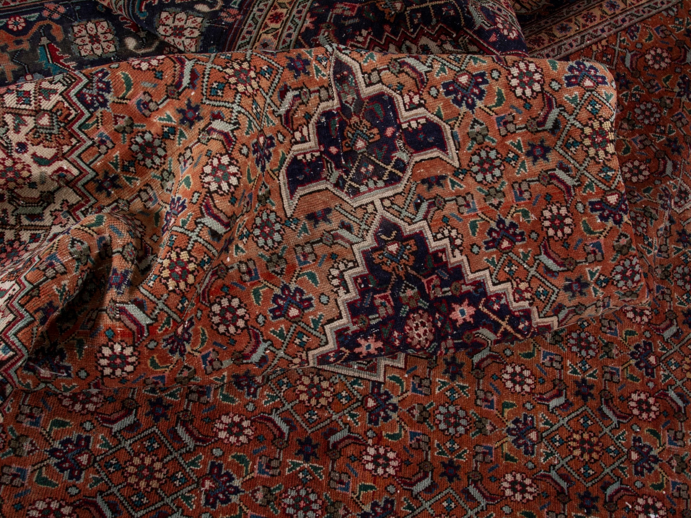 Persian Tabriz oversized rug in rust and navy, view 19 of 21