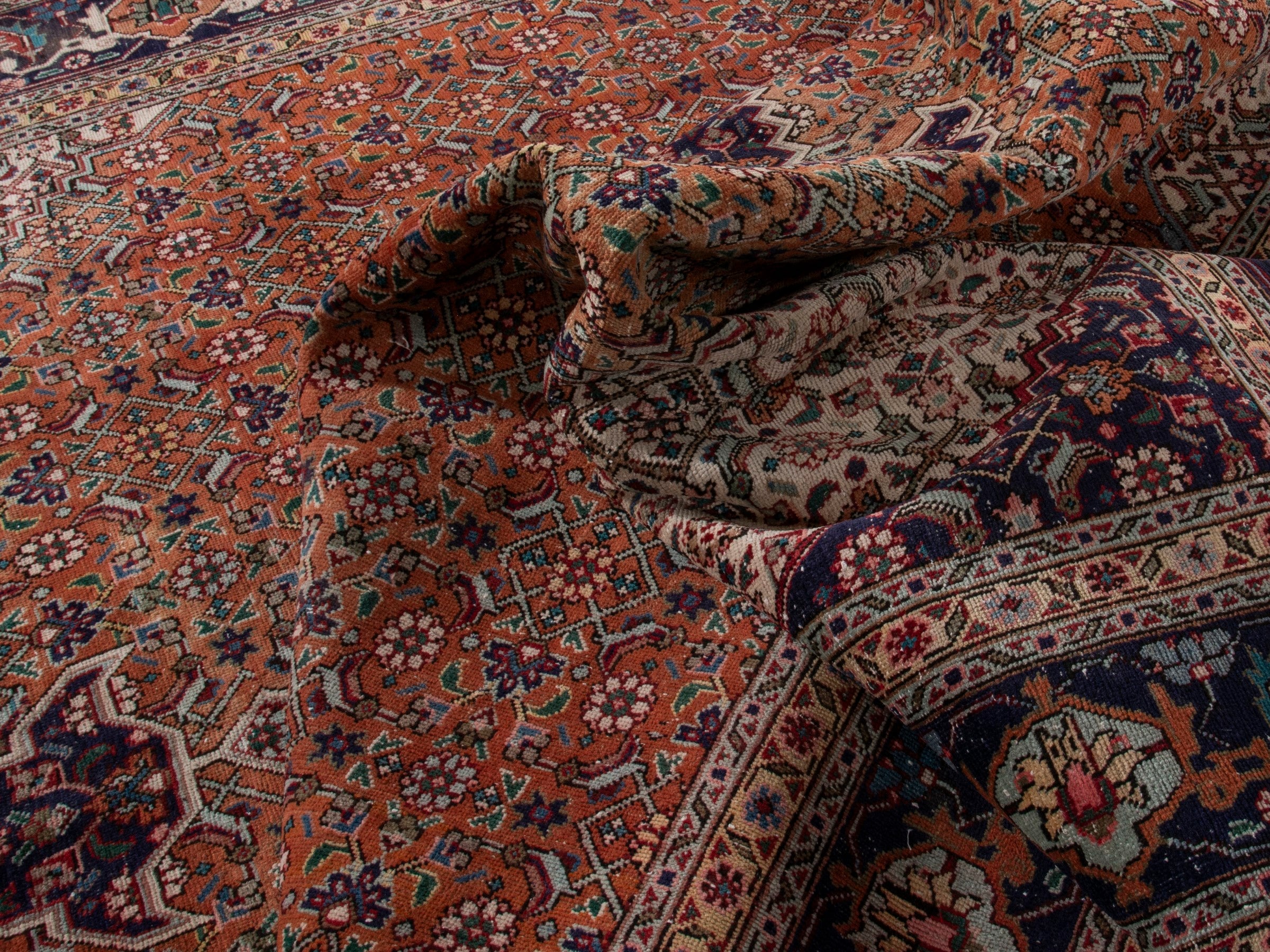 Persian Tabriz oversized rug in rust and navy, view 20 of 21