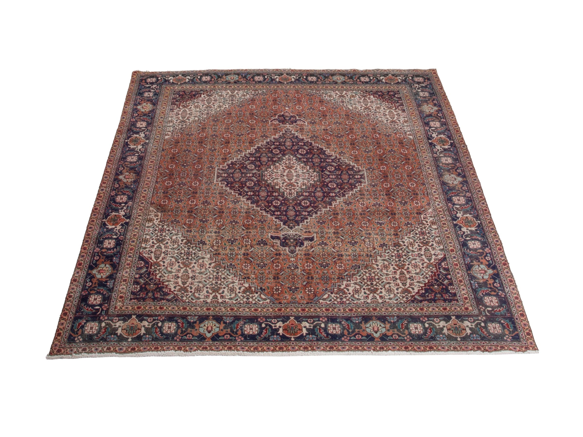 Persian Tabriz oversized rug in rust and navy, view 2 of 21