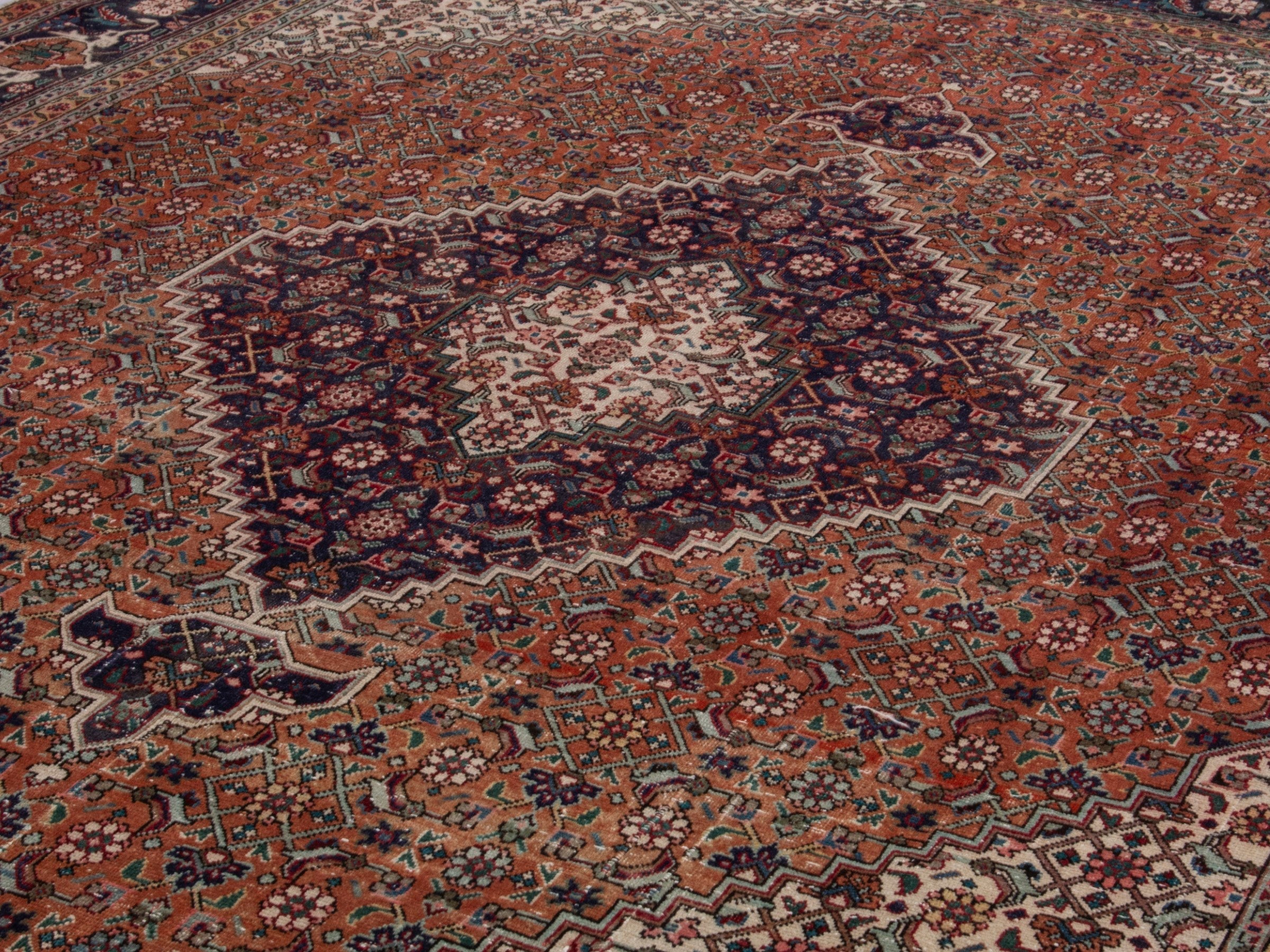 Persian Tabriz oversized rug in rust and navy, view 9 of 21