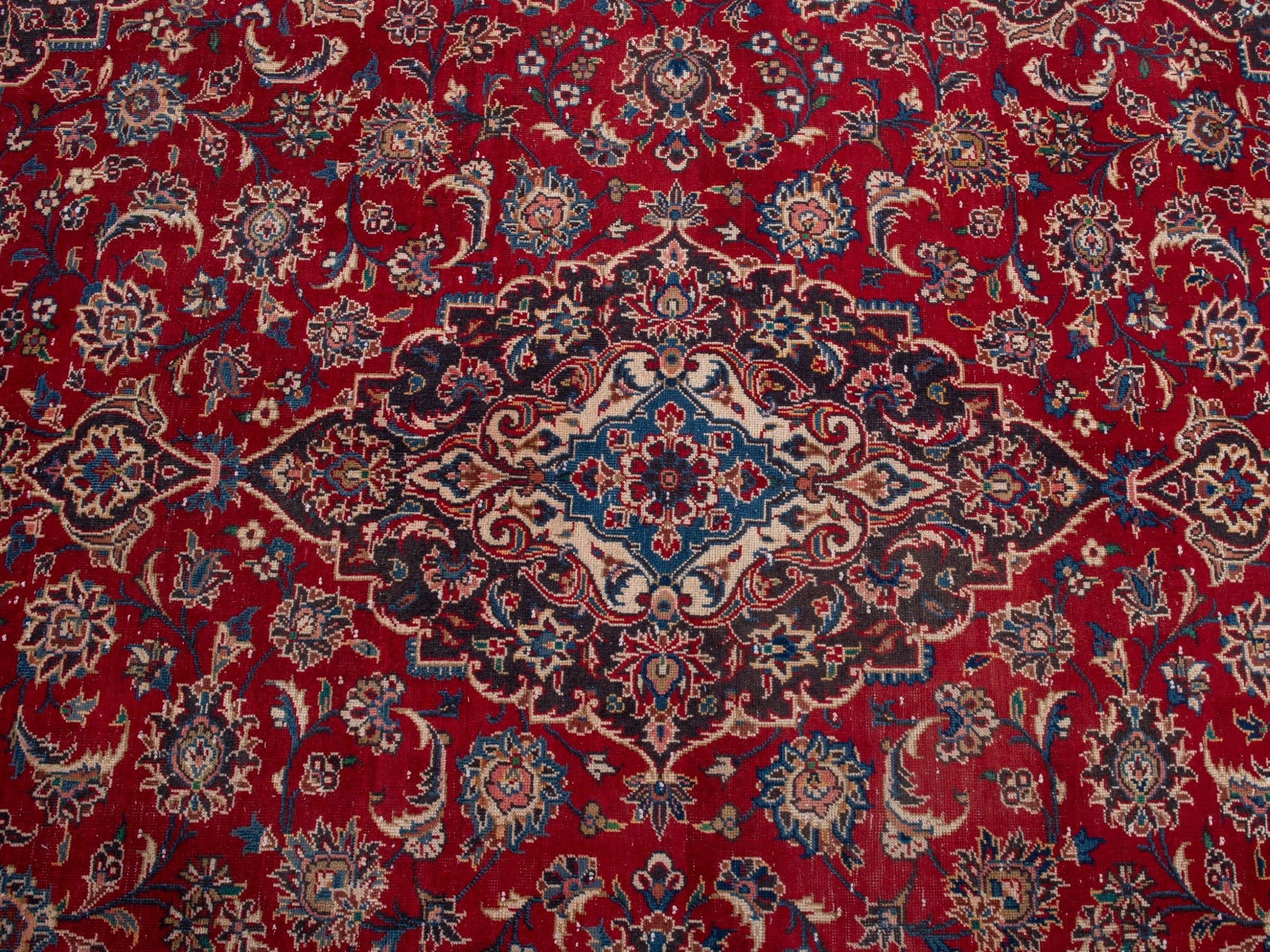 Persian Kashan oversized rug in deep red and brown, view 12 of 21