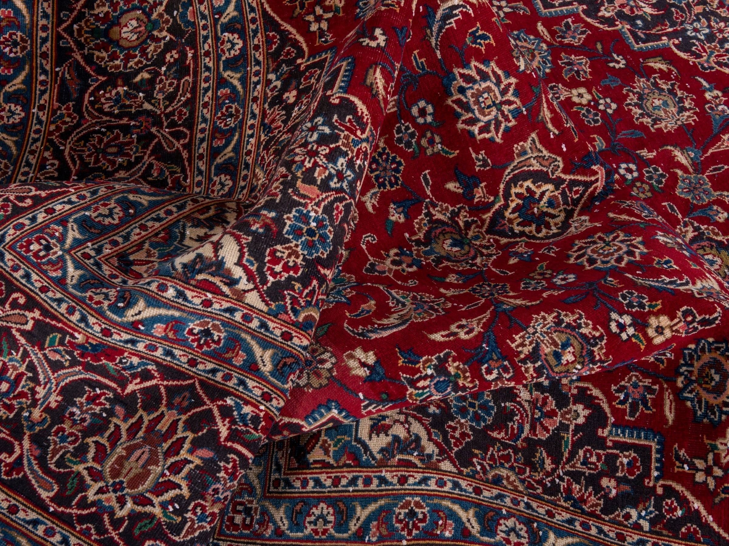 Persian Kashan oversized rug in deep red and brown, view 19 of 21