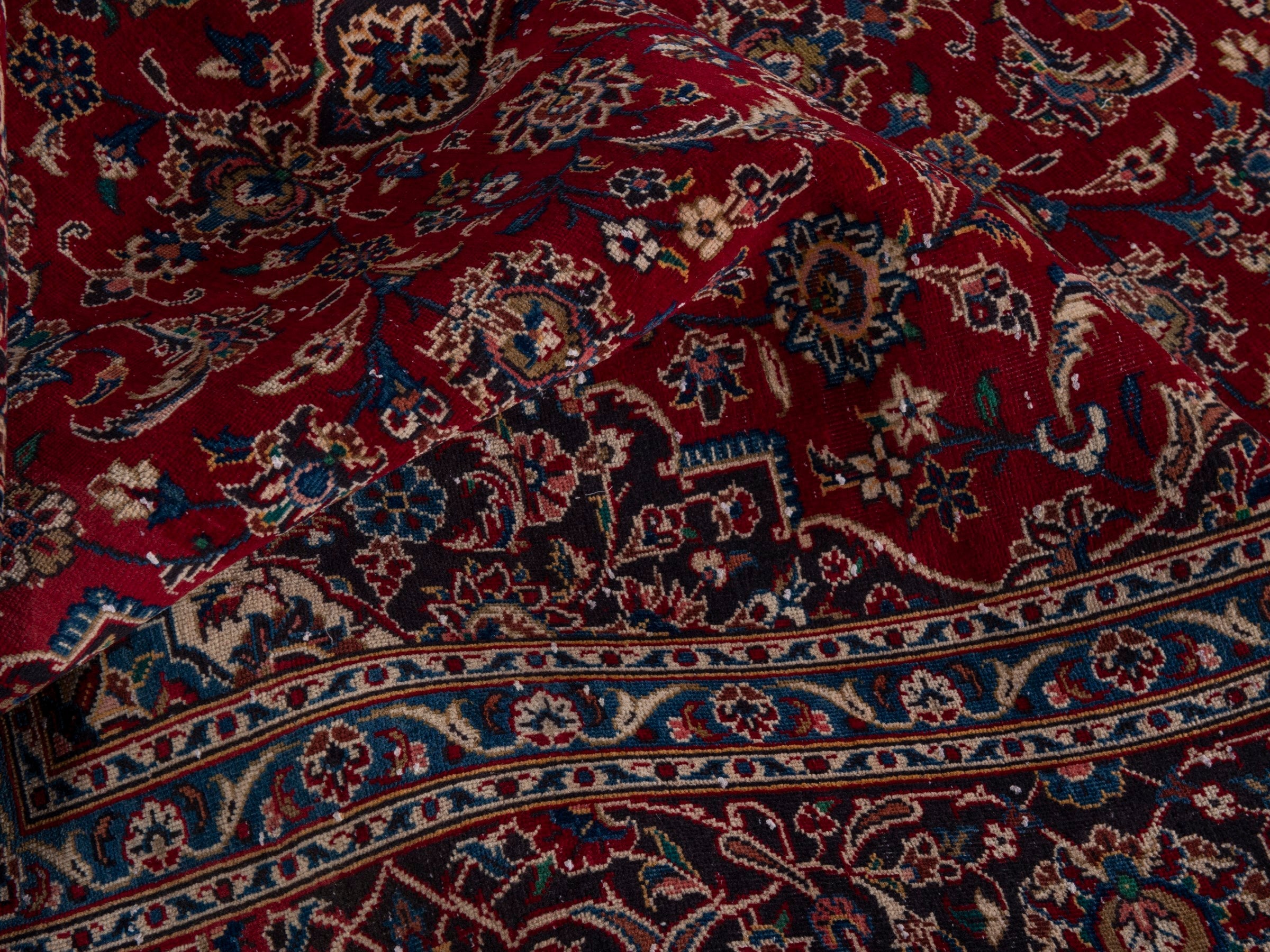 Persian Kashan oversized rug in deep red and brown, view 21 of 21