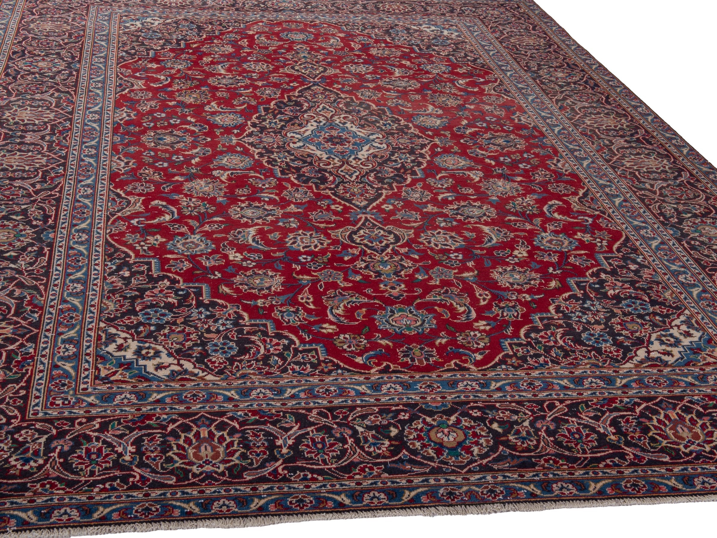 Persian Kashan oversized rug in deep red and brown, view 8 of 21