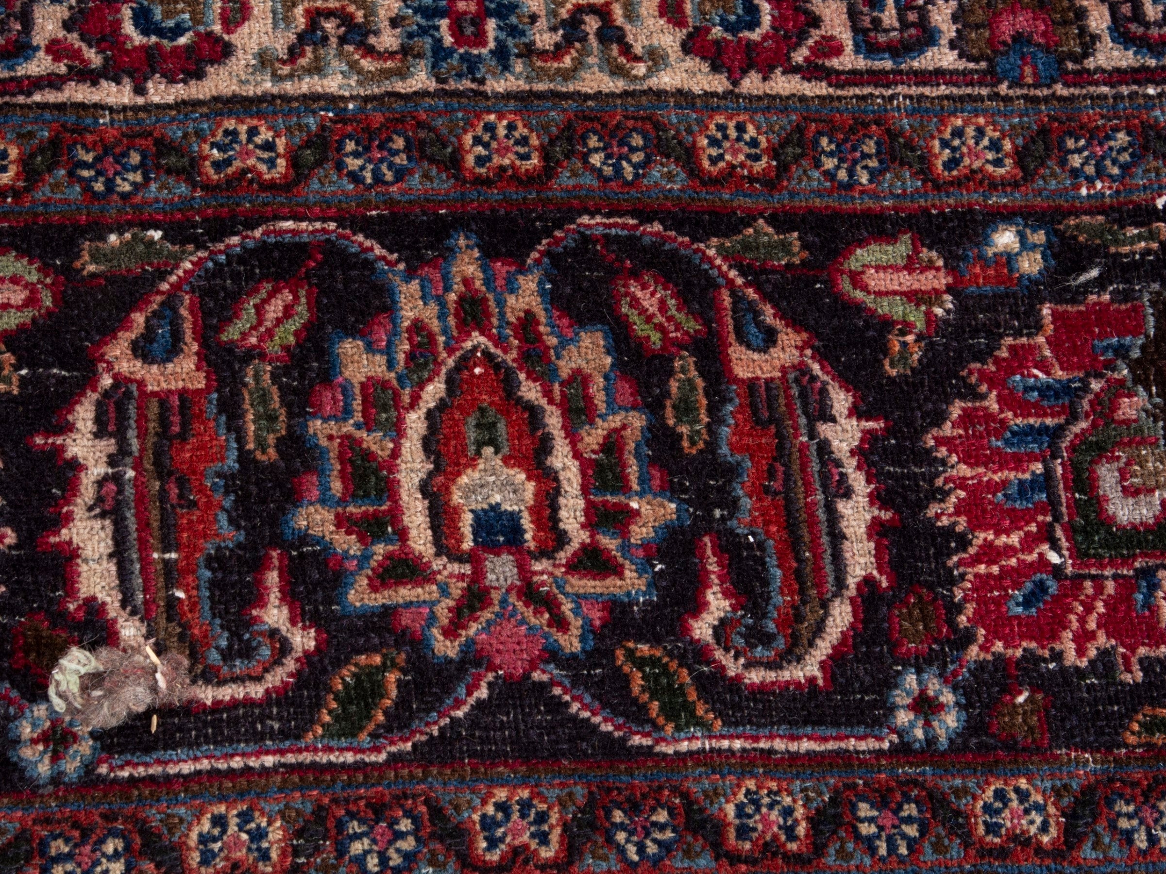 Persian Mashhad oversized rug in deep red and faded red, view 10 of 16