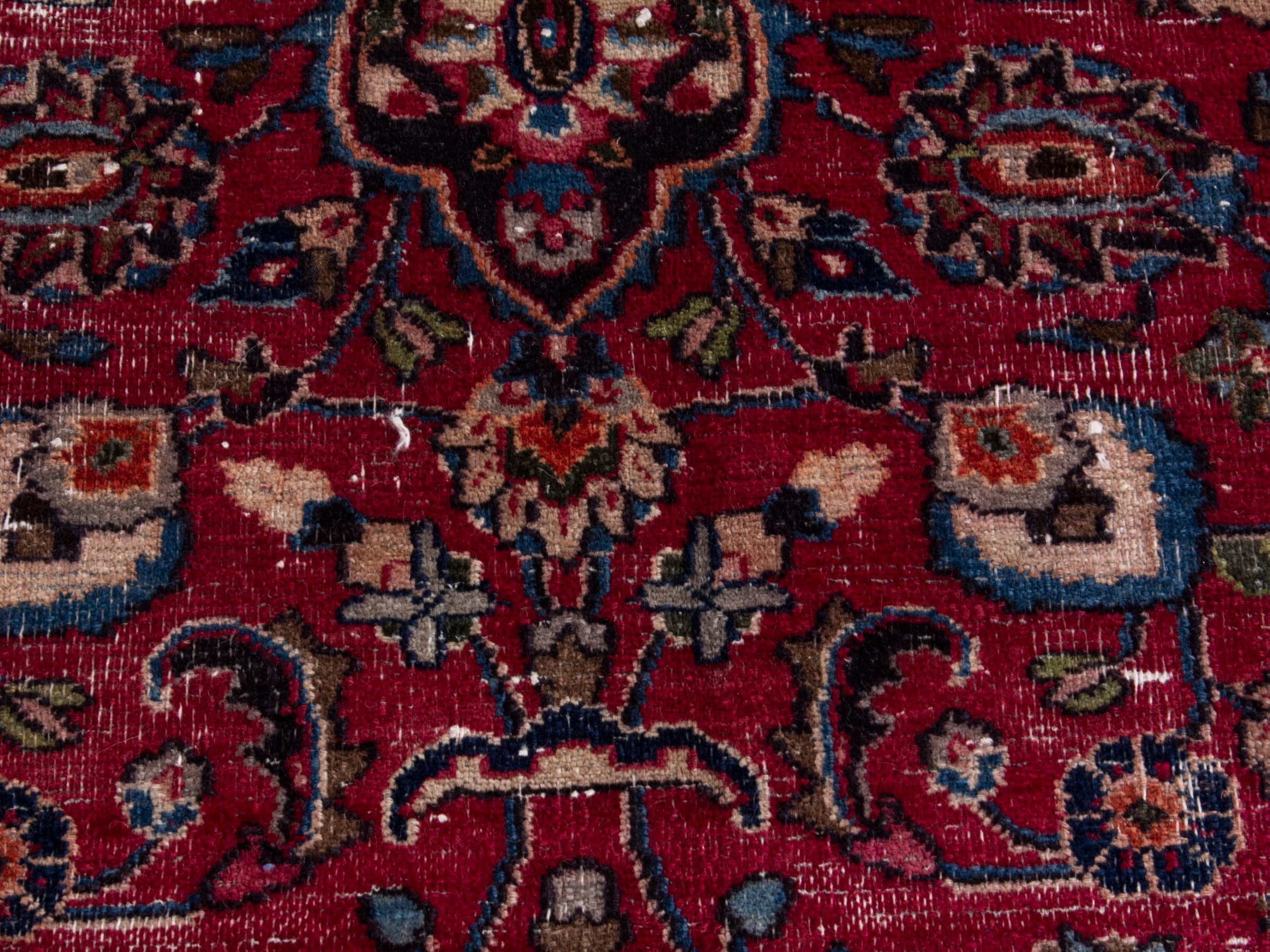 Persian Mashhad oversized rug in deep red and faded red, view 11 of 16