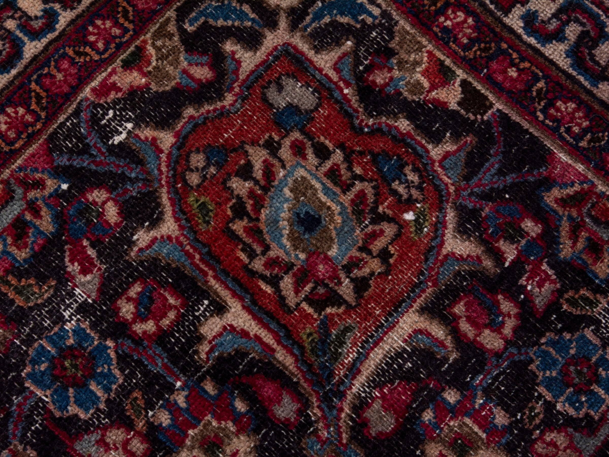 Persian Mashhad oversized rug in deep red and faded red, view 12 of 16