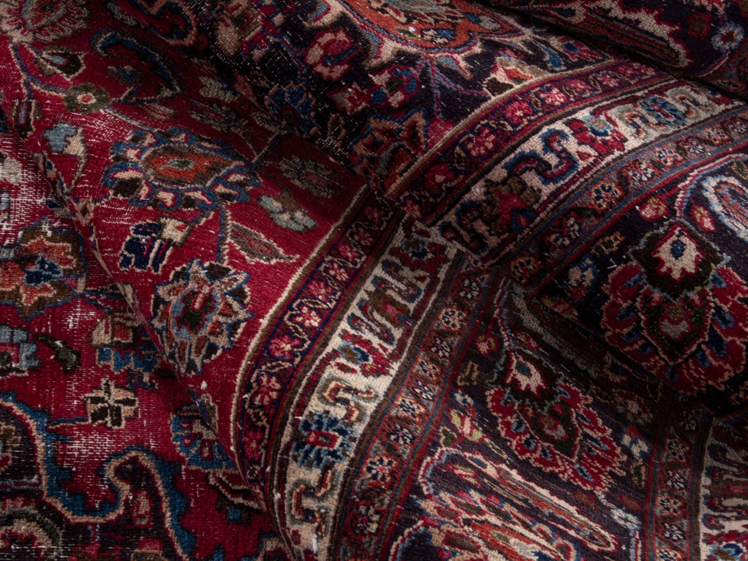 Persian Mashhad oversized rug in deep red and faded red, view 15 of 16