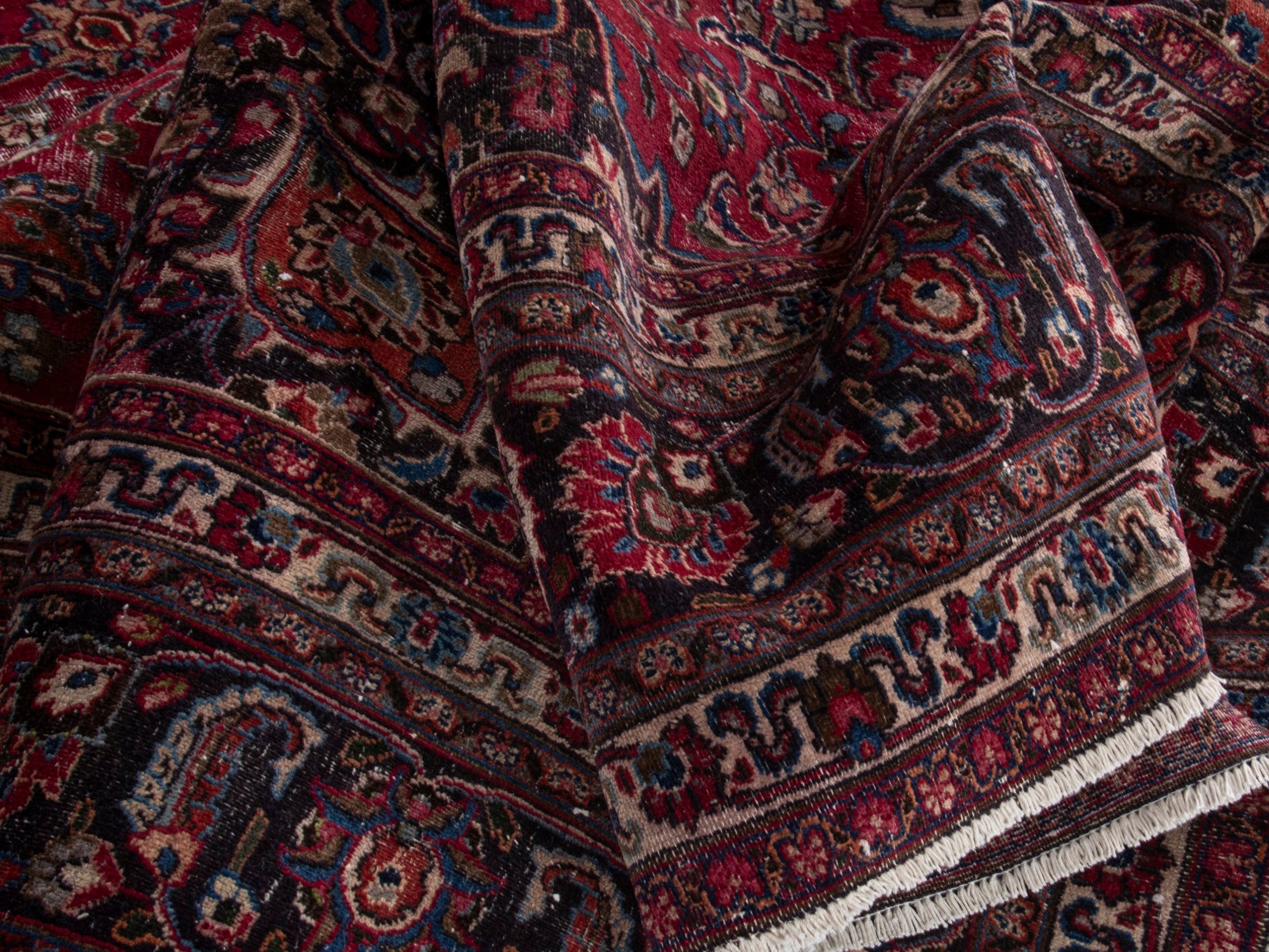 Persian Mashhad oversized rug in deep red and faded red, view 16 of 16