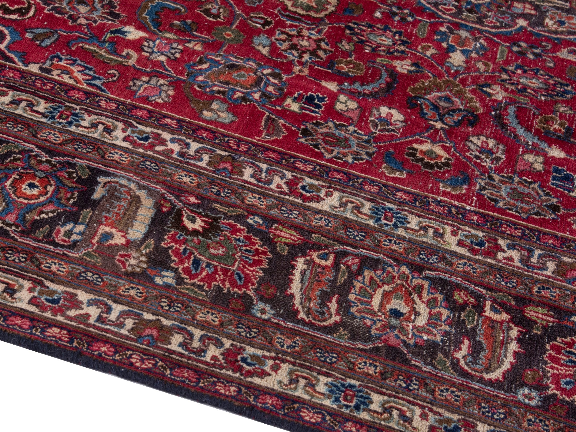 Persian Mashhad oversized rug in deep red and faded red, view 7 of 16