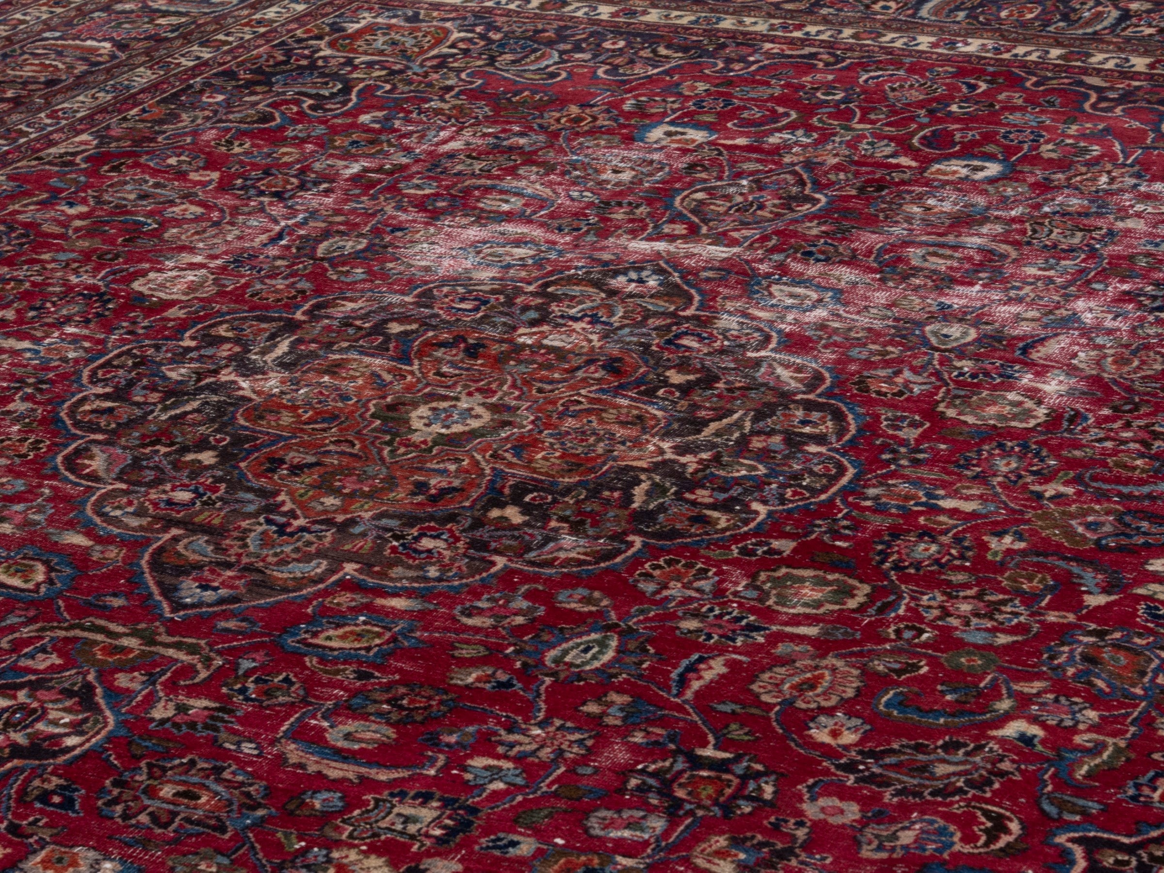 Persian Mashhad oversized rug in deep red and faded red, view 8 of 16