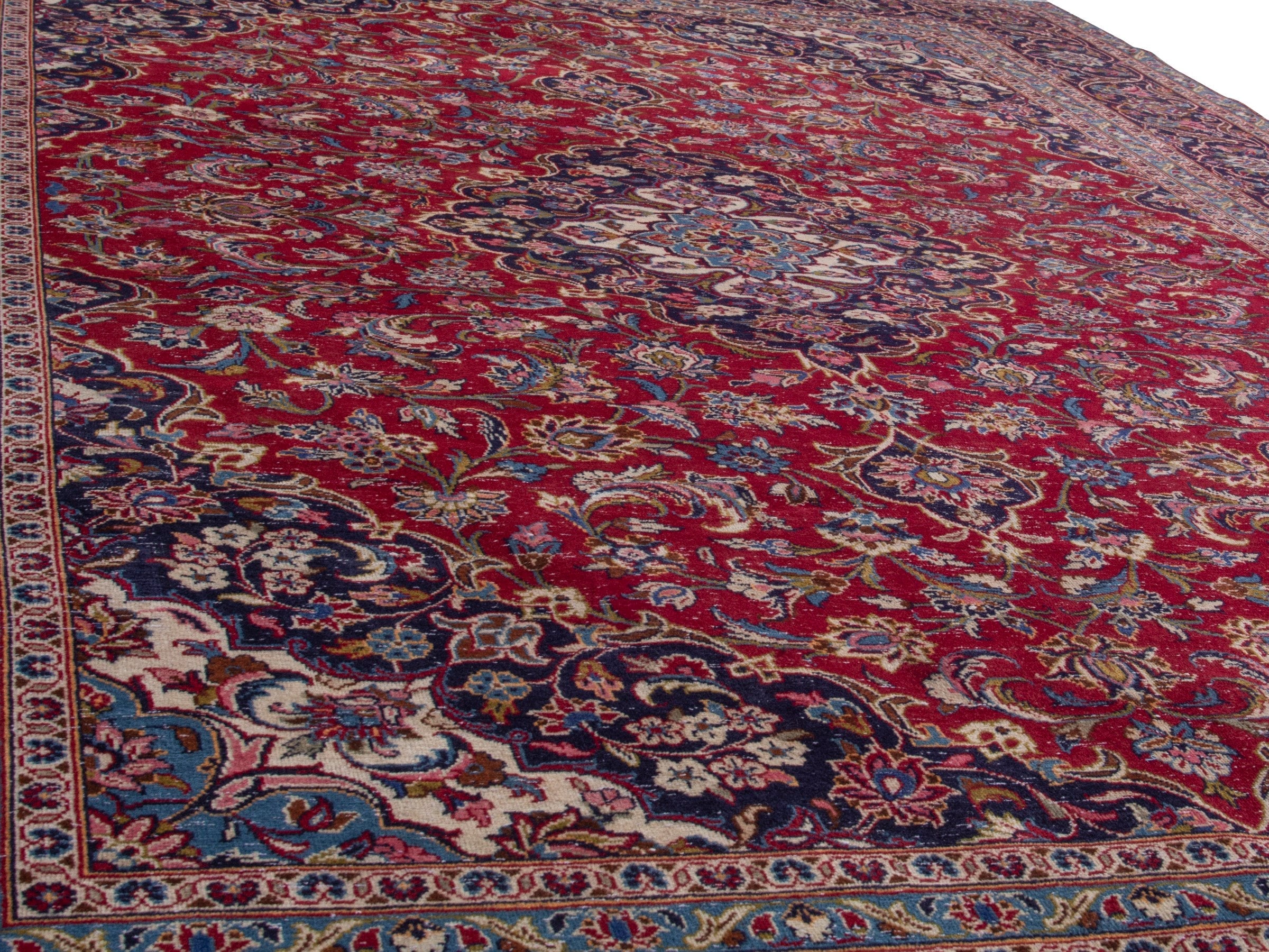 Persian Kashan oversized rug in deep red and burgundy, view 9 of 12