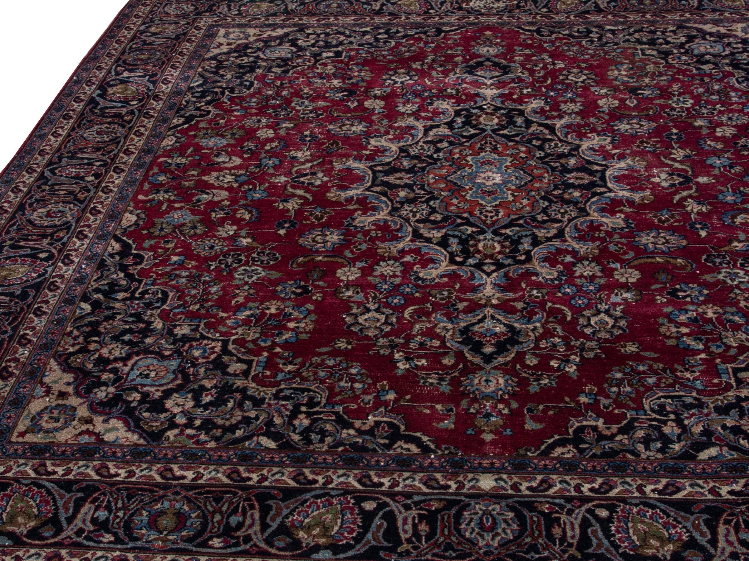 Persian Mashhad oversized rug in burgundy and navy, view 10 of 21