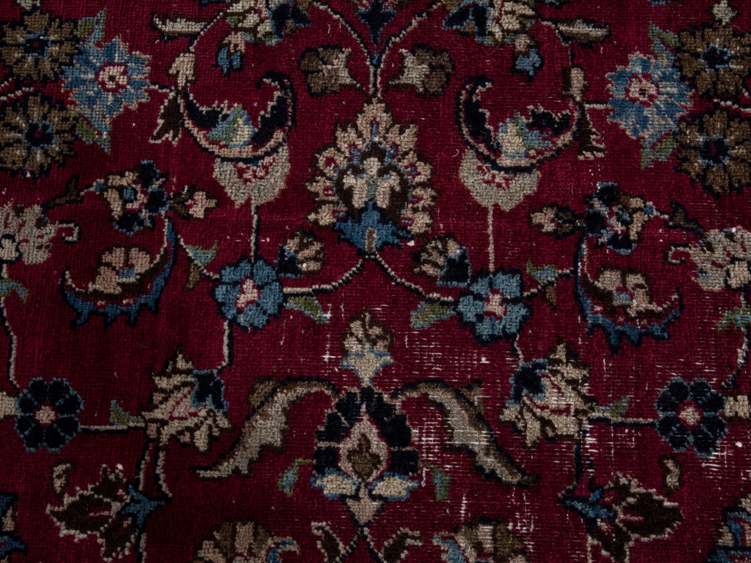 Persian Mashhad oversized rug in burgundy and navy, view 15 of 21