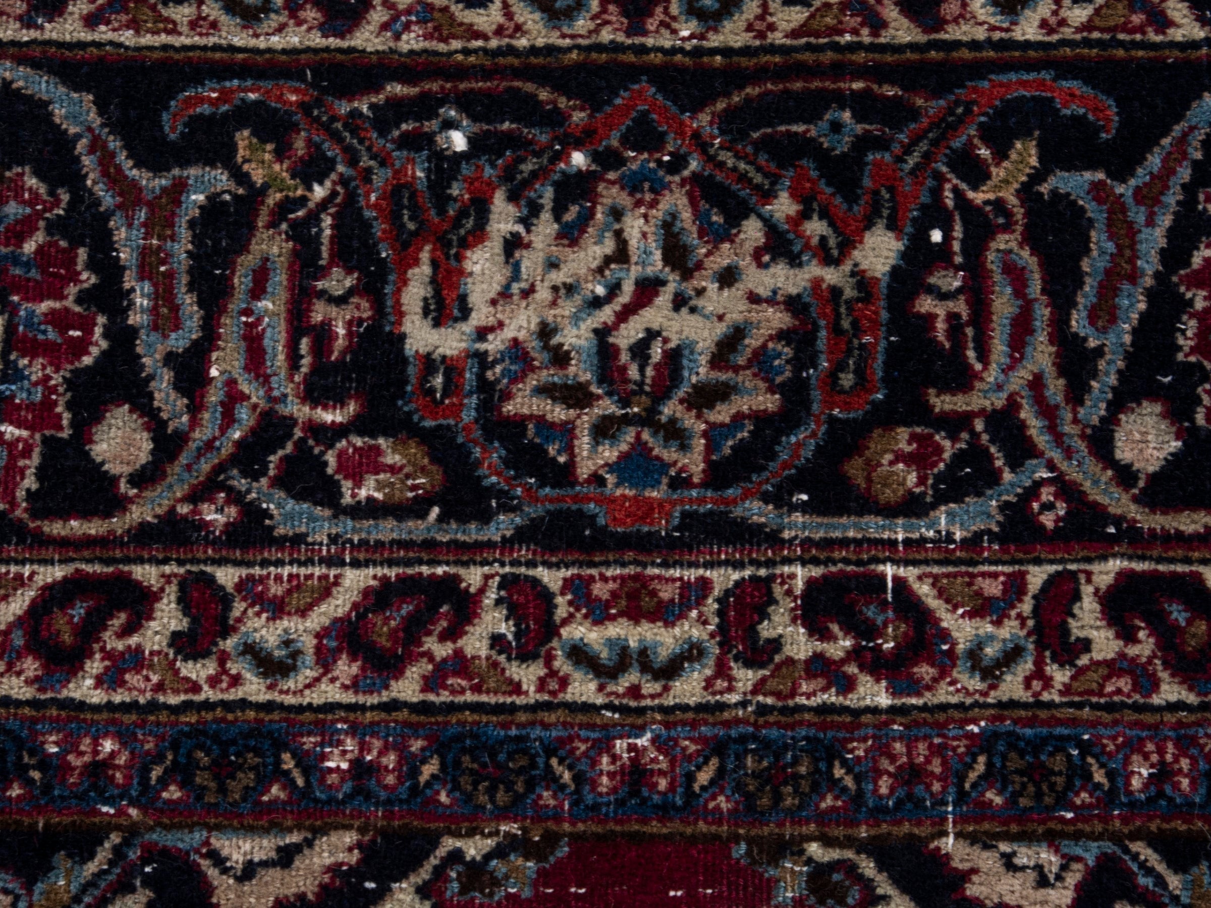 Persian Mashhad oversized rug in burgundy and navy, view 16 of 21