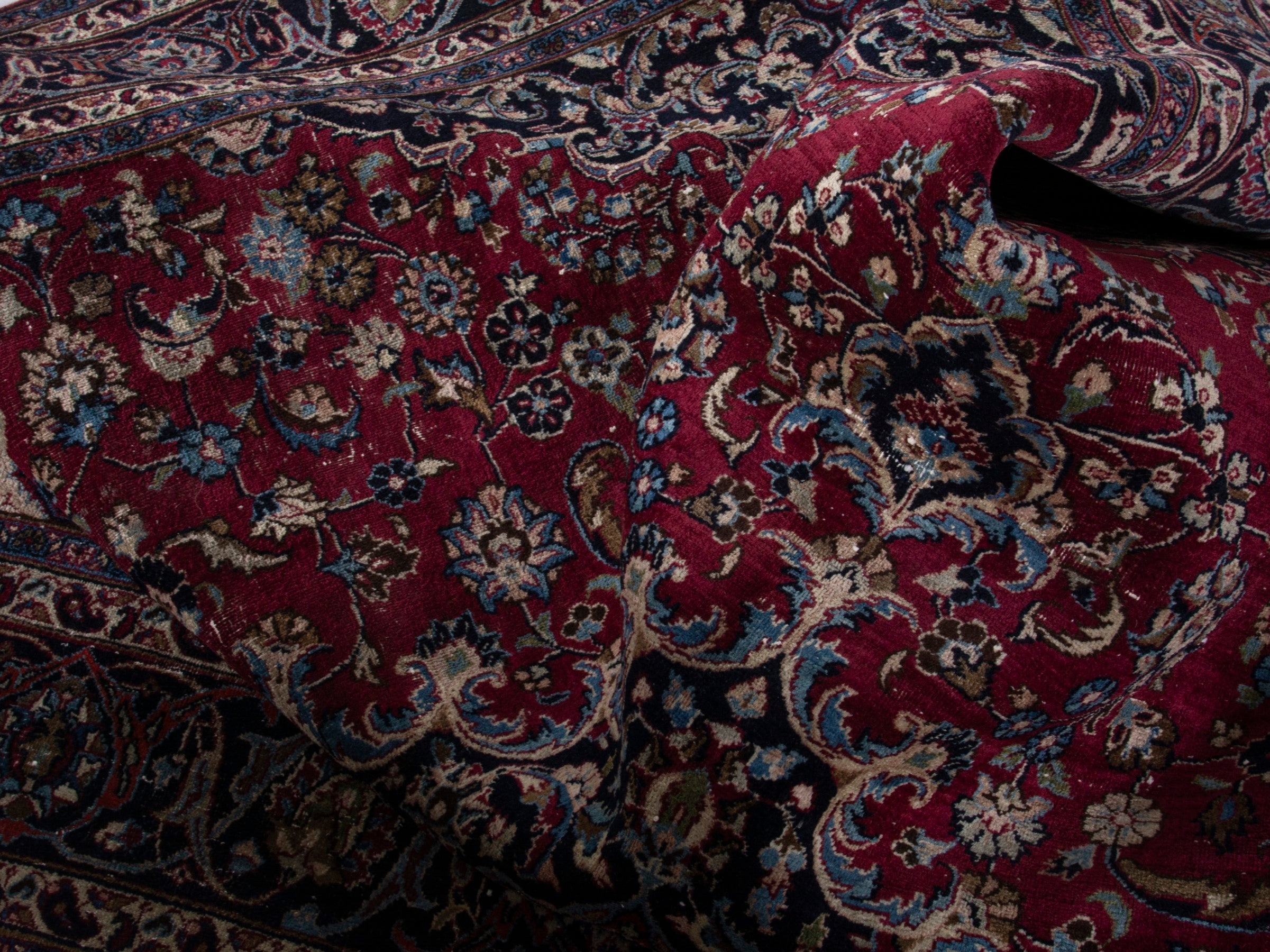 Persian Mashhad oversized rug in burgundy and navy, view 19 of 21