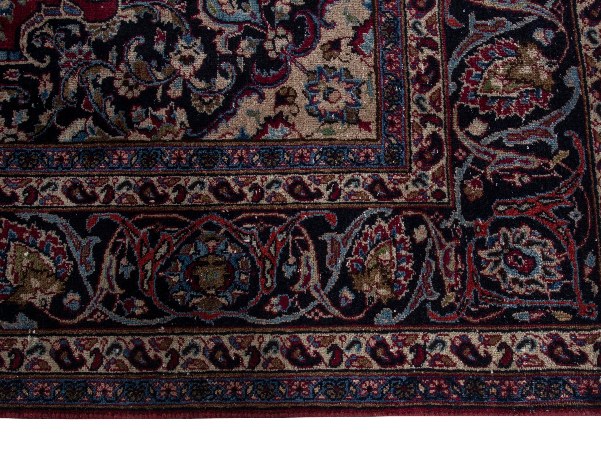 Persian Mashhad oversized rug in burgundy and navy, view 5 of 21