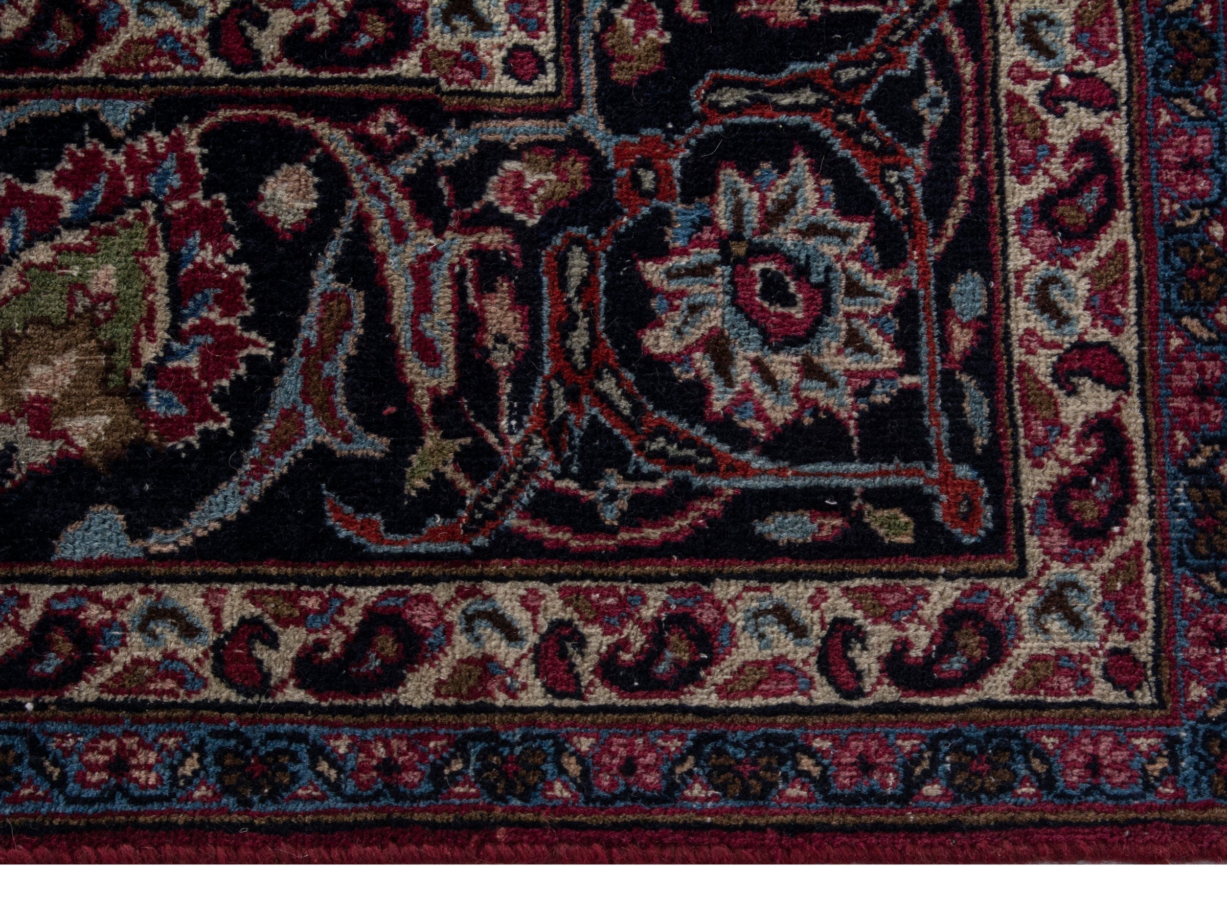 Persian Mashhad oversized rug in burgundy and navy, view 6 of 21