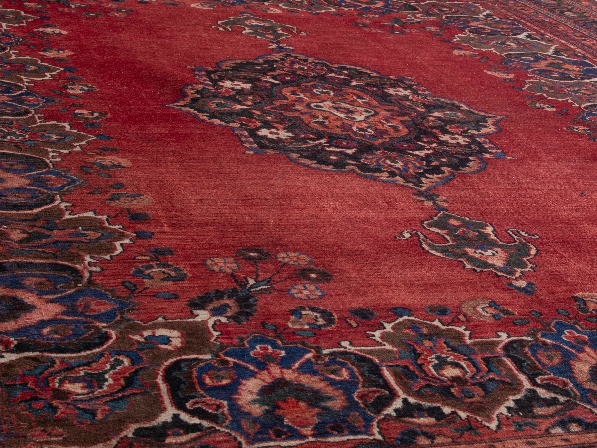 Persian Mashhad oversized rug in deep red and navy, view 10 of 20