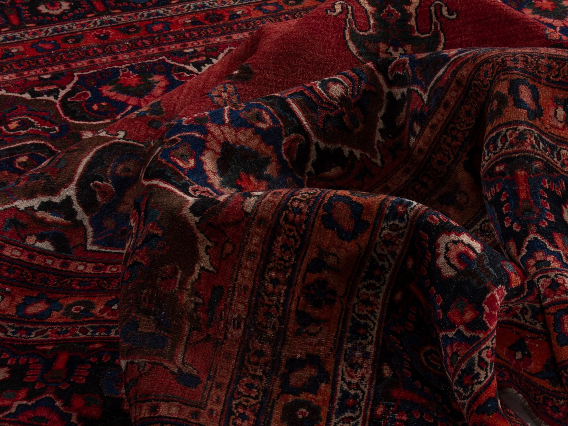 Persian Mashhad oversized rug in deep red and navy, view 17 of 20