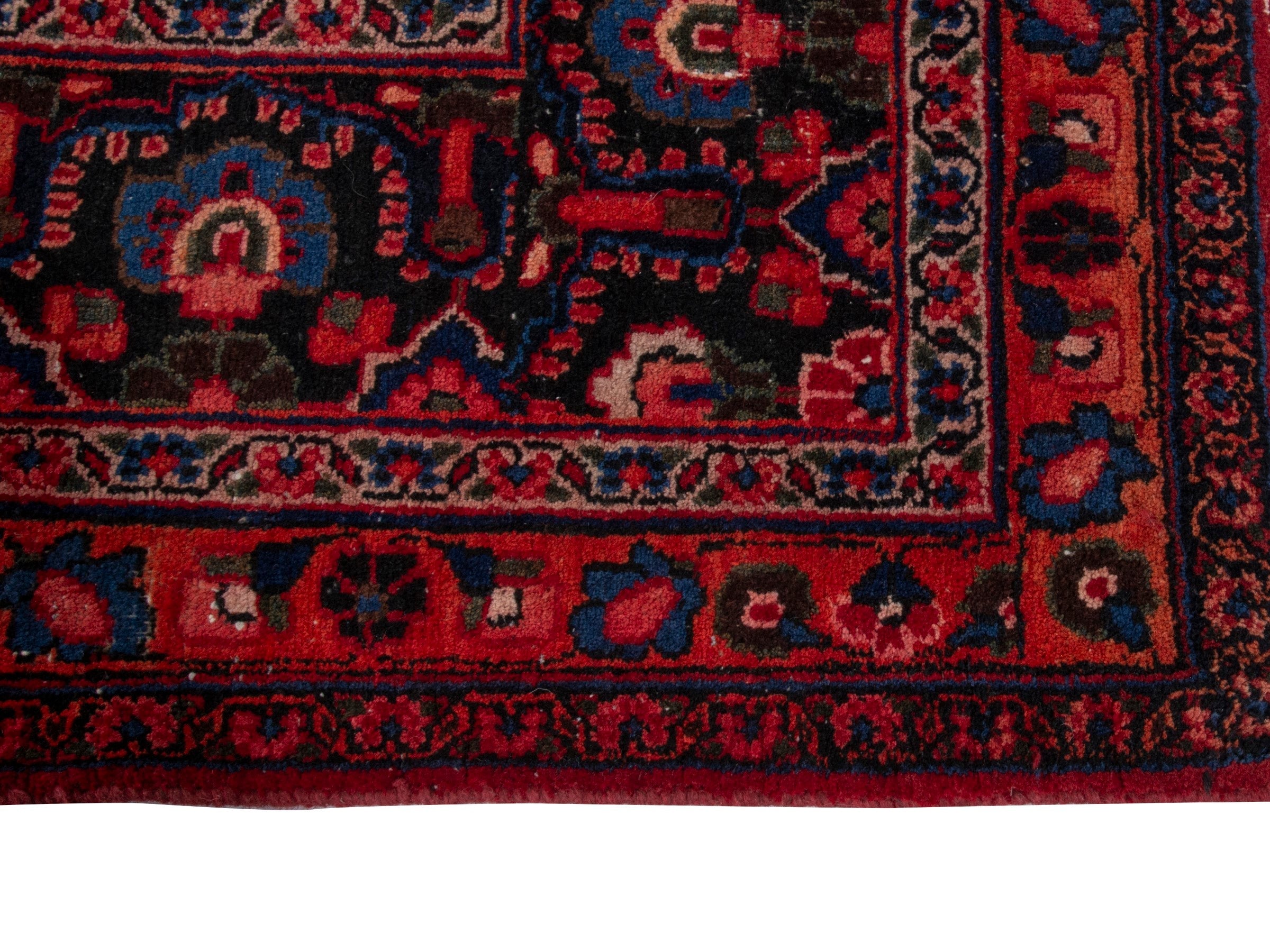 Persian Mashhad oversized rug in deep red and navy, view 5 of 20