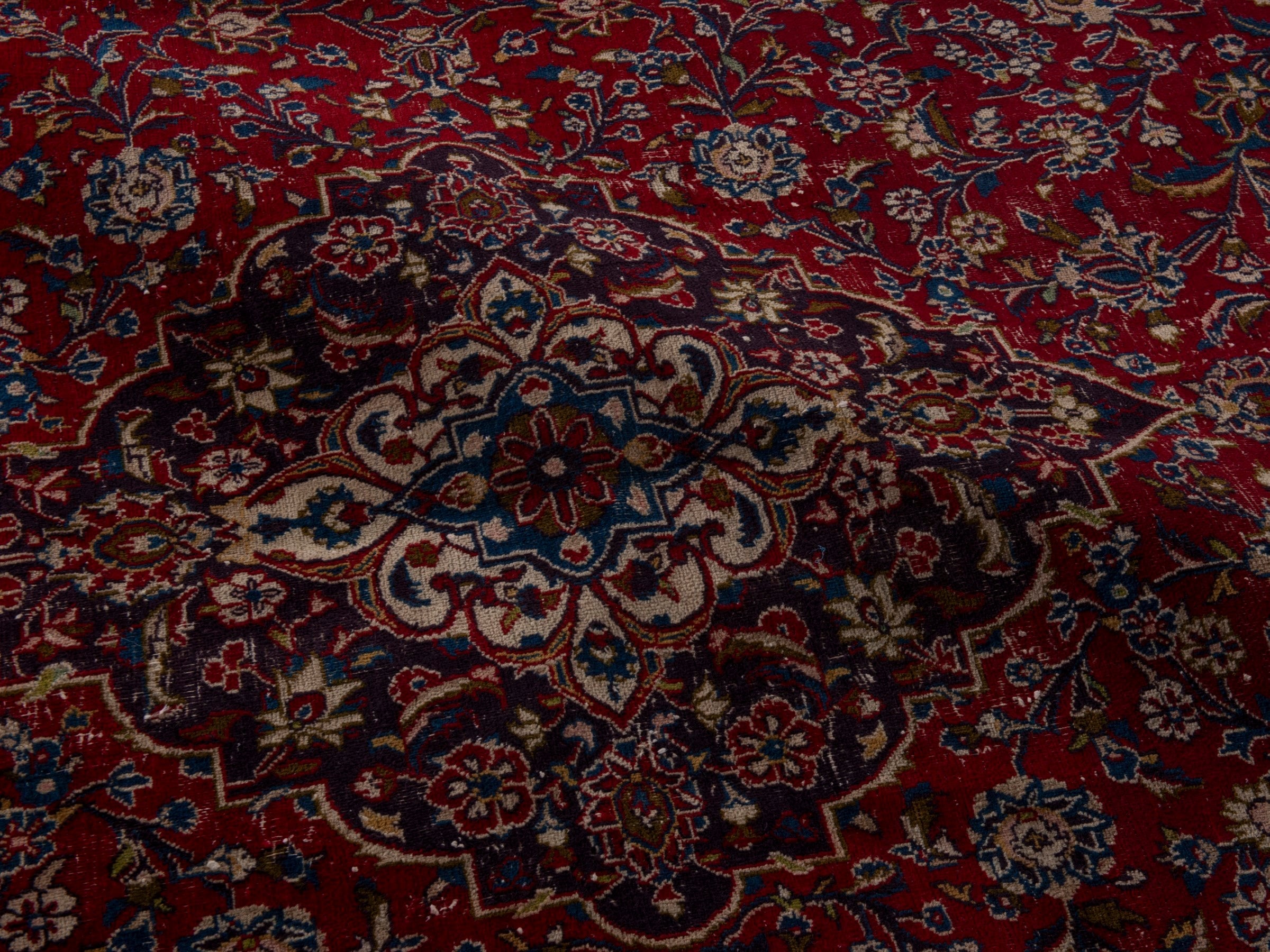 Persian Mashhad oversized rug in deep red and black cherry, view 19 of 20