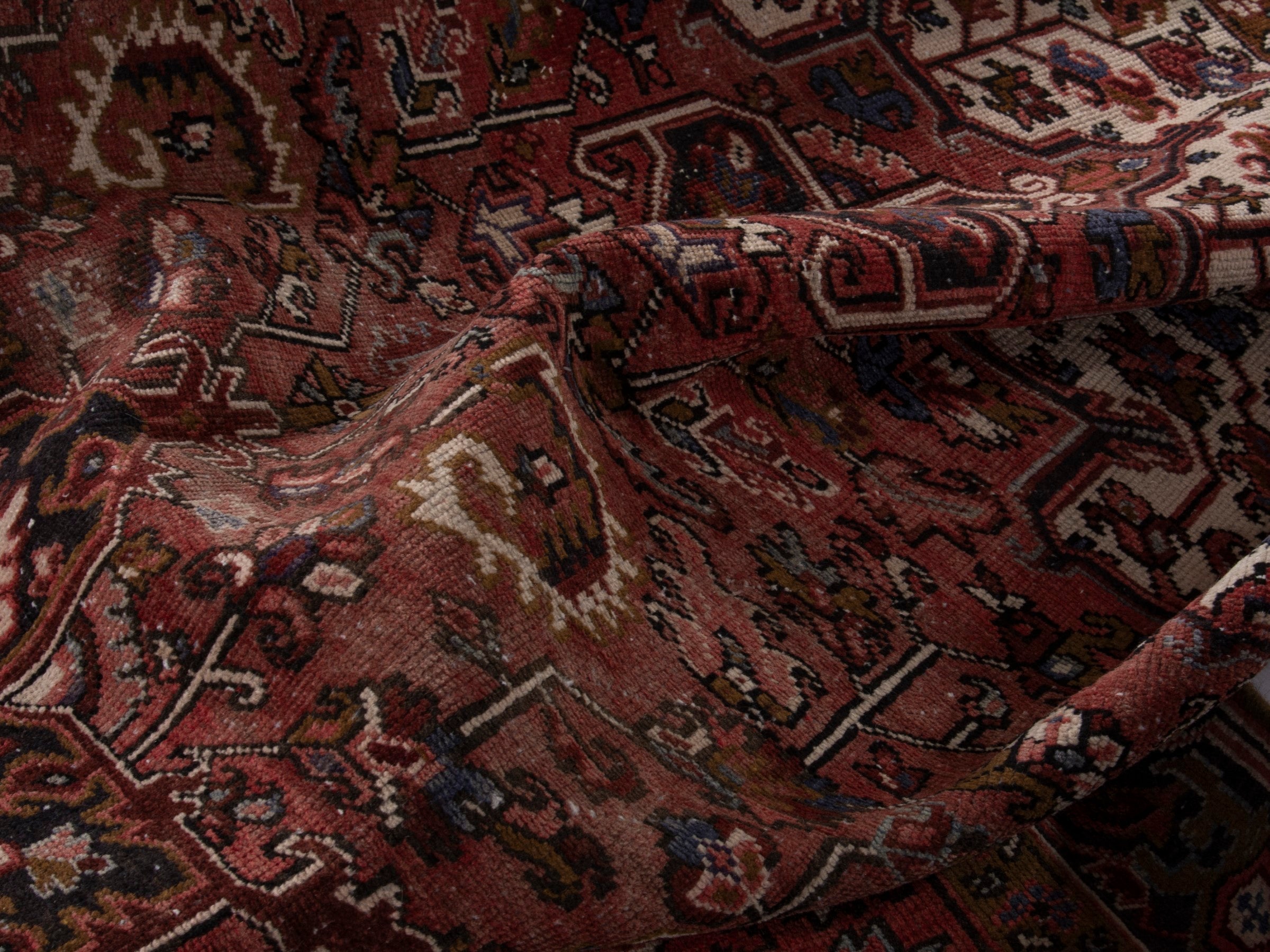 Persian Heriz area rug in deep red and burgundy, view 18 of 19