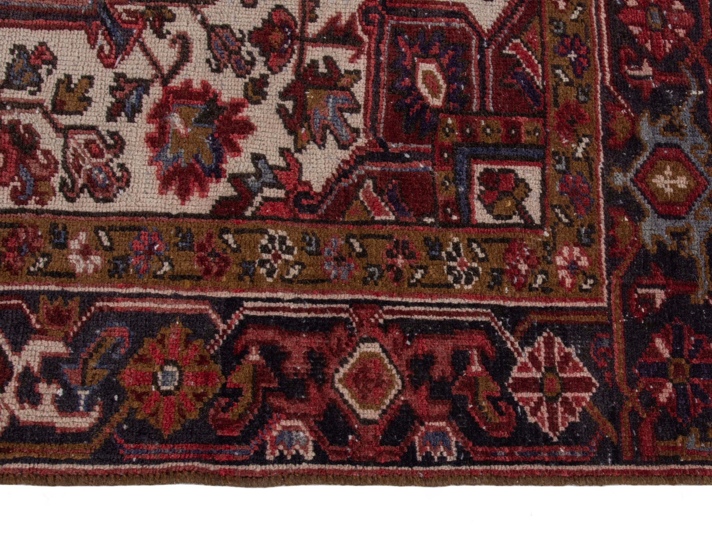 Persian Heriz area rug in deep red and burgundy, view 5 of 19