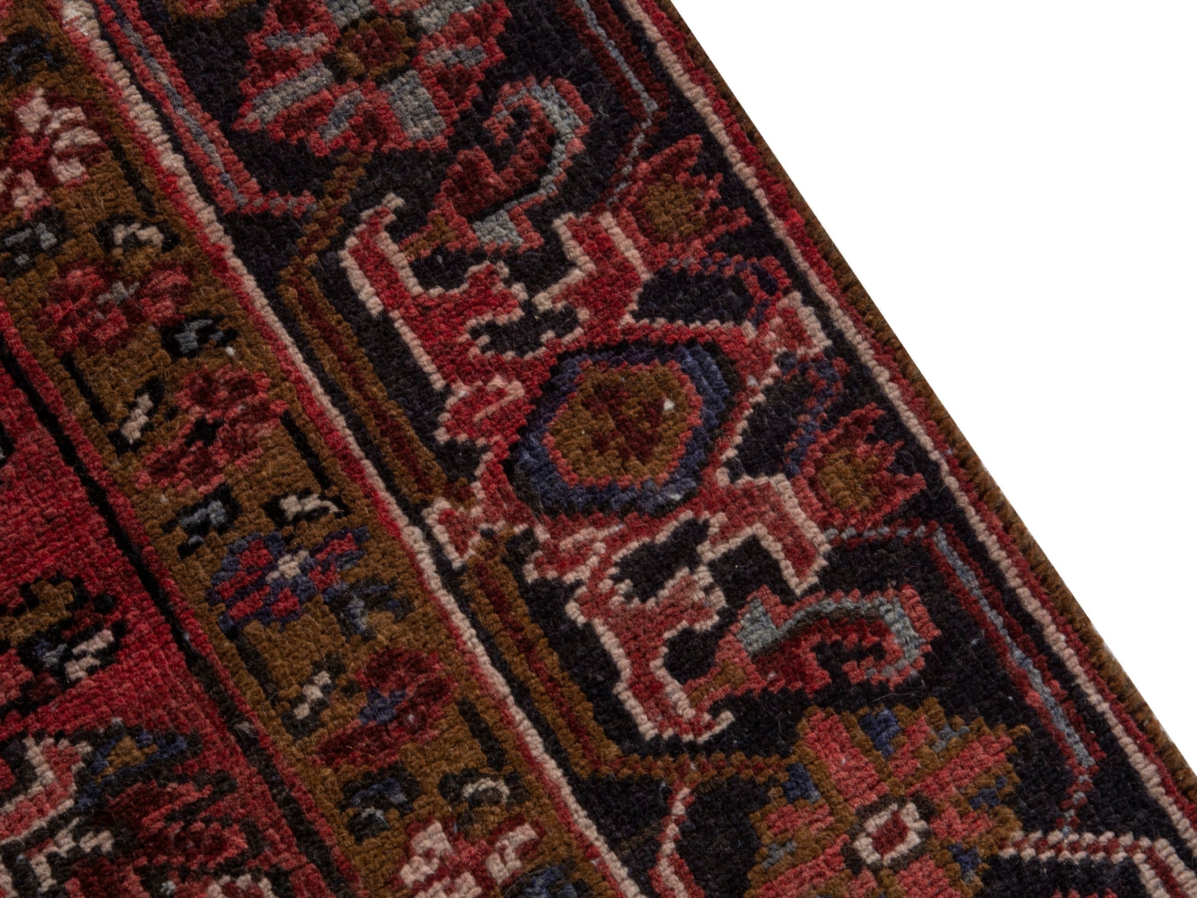 Persian Heriz area rug in deep red and burgundy, view 7 of 19
