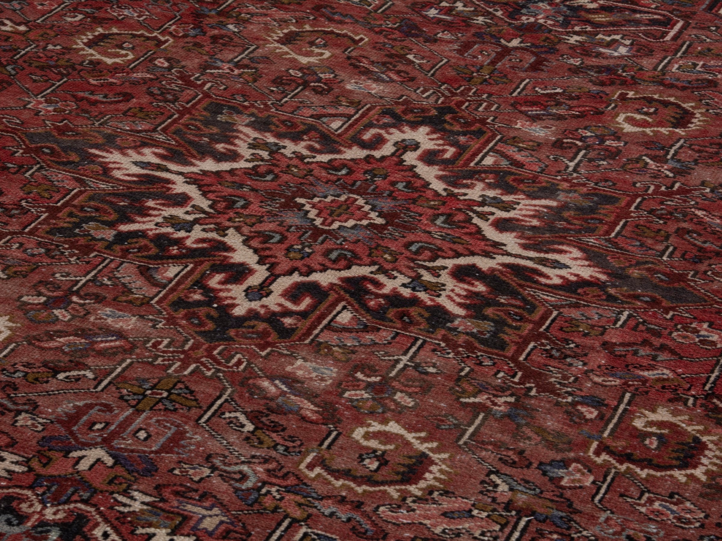 Persian Heriz area rug in deep red and burgundy, view 9 of 19