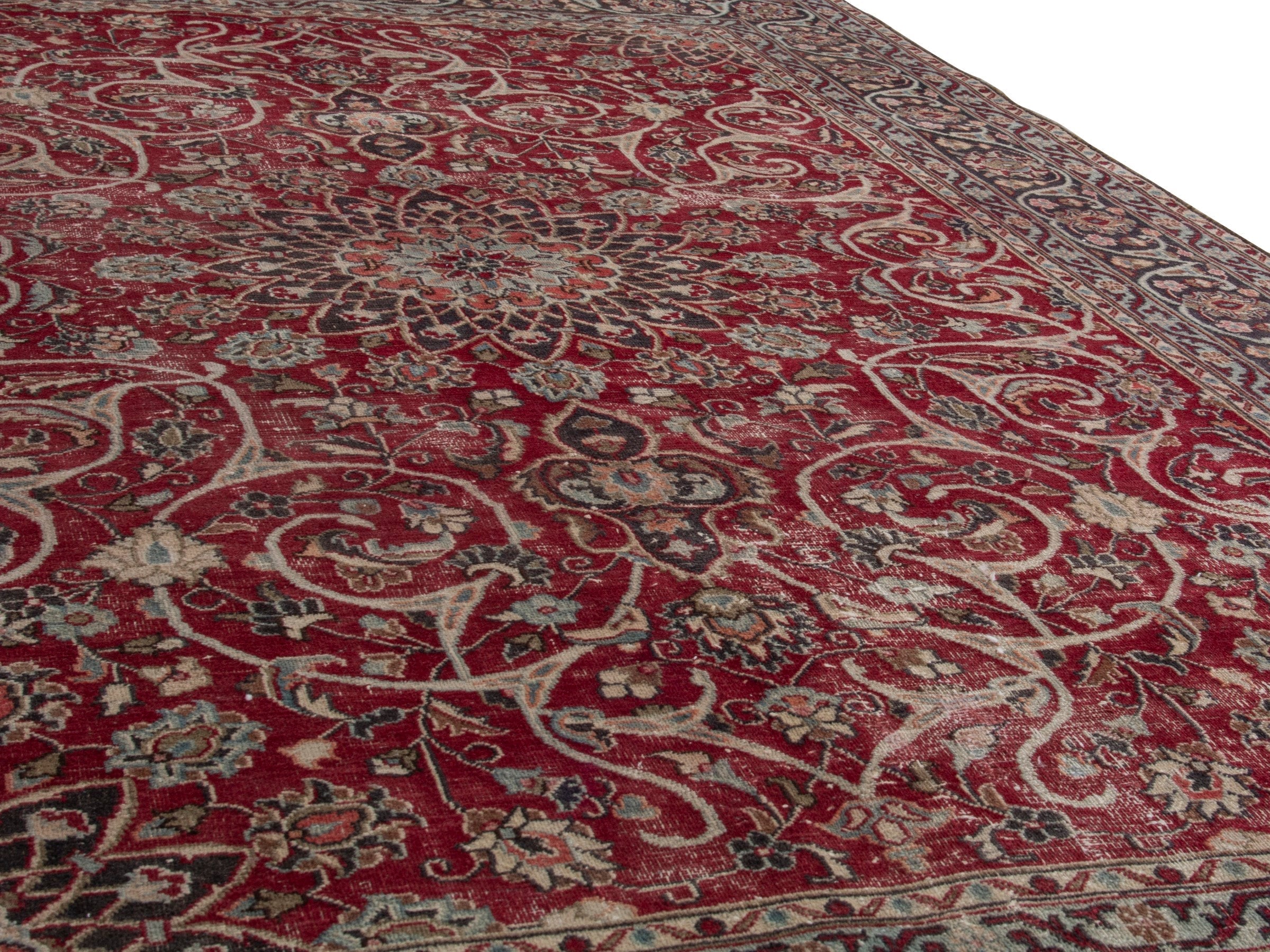 Persian Mashhad area rug in deep red and dark brown, view 10 of 19