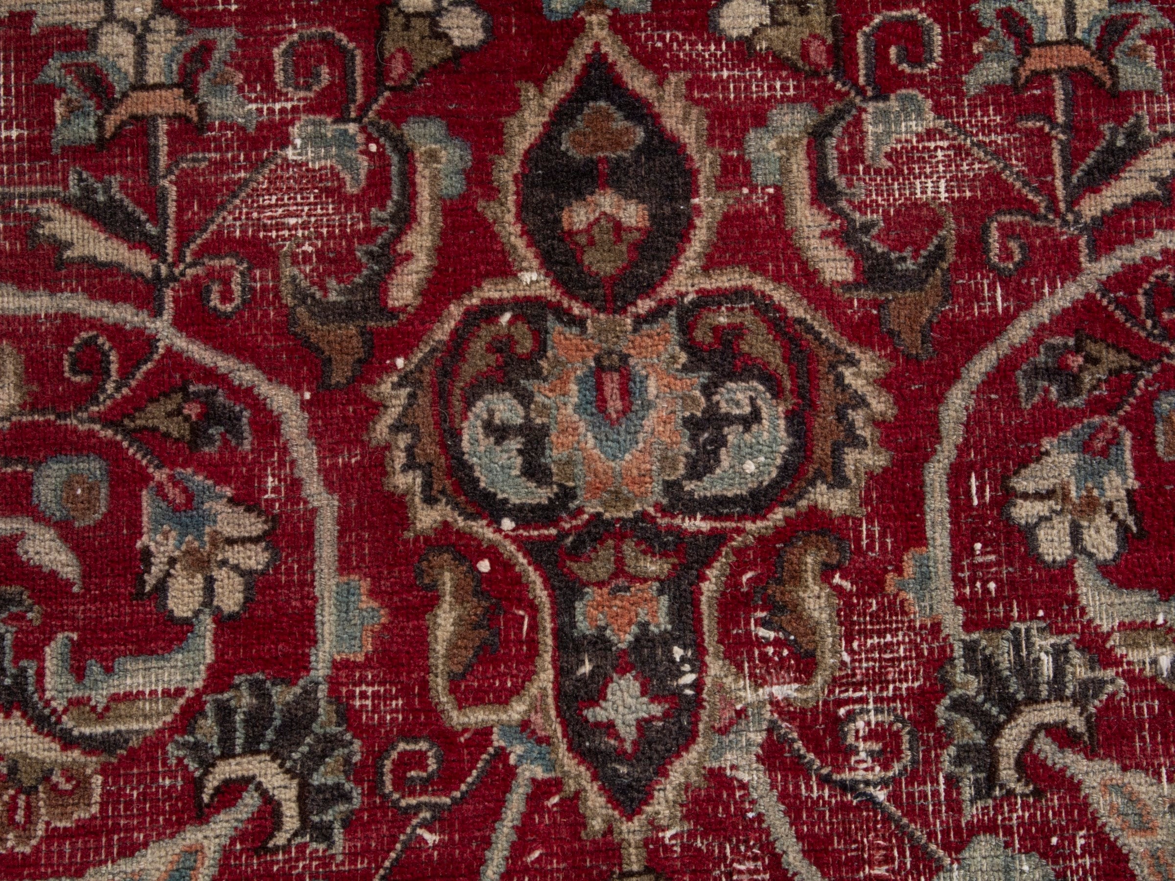 Persian Mashhad area rug in deep red and dark brown, view 12 of 19