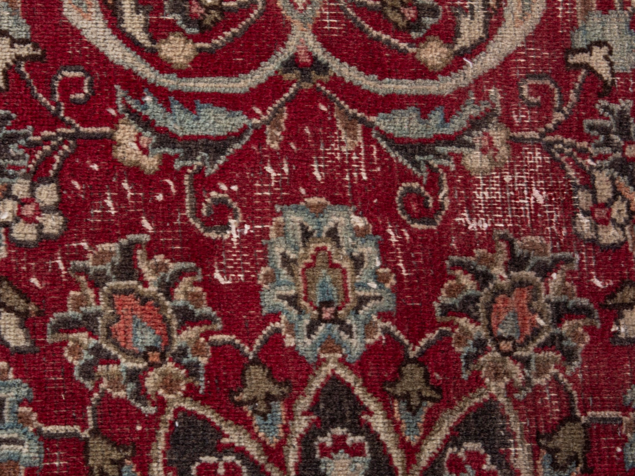 Persian Mashhad area rug in deep red and dark brown, view 13 of 19