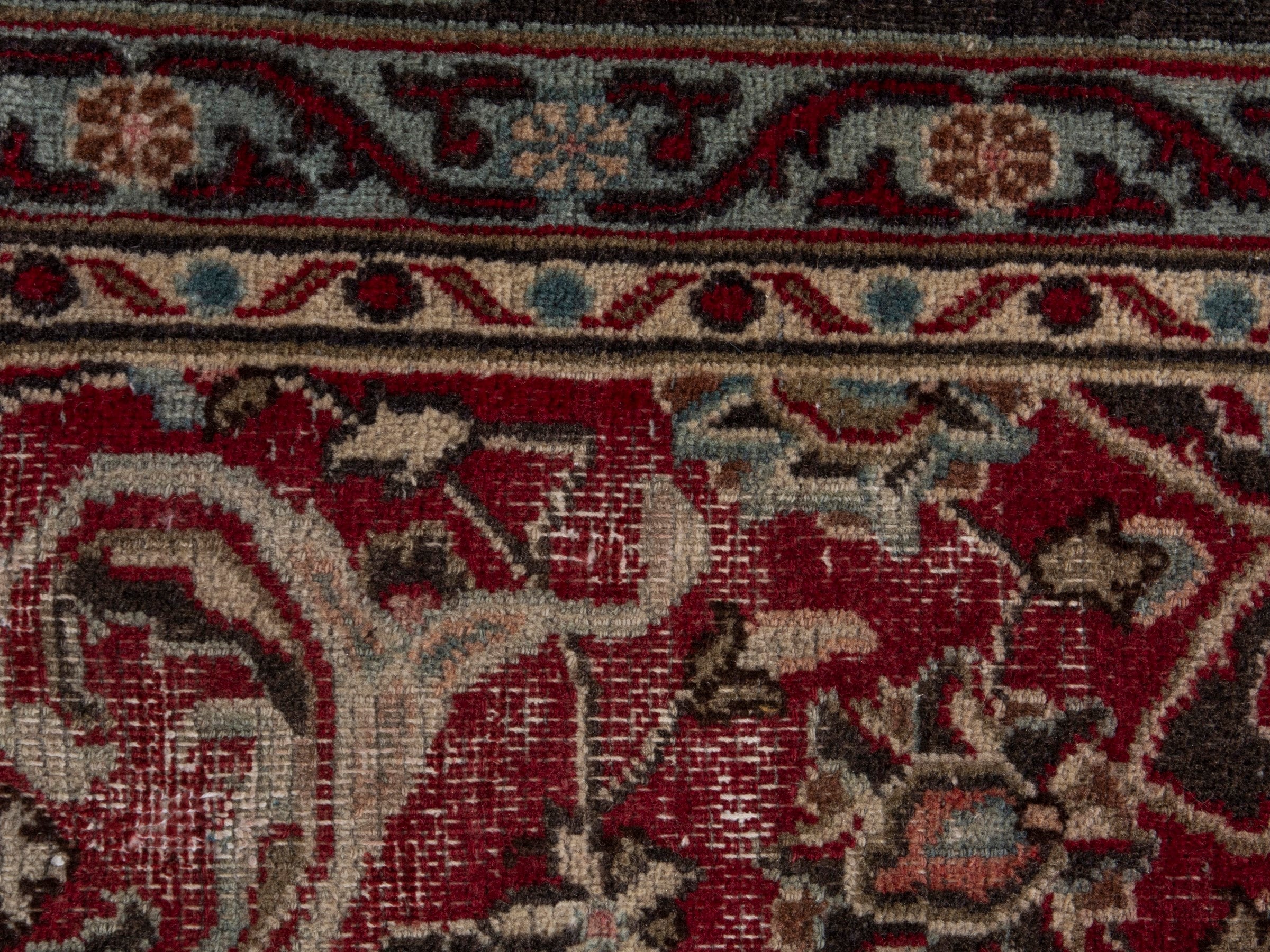 Persian Mashhad area rug in deep red and dark brown, view 14 of 19