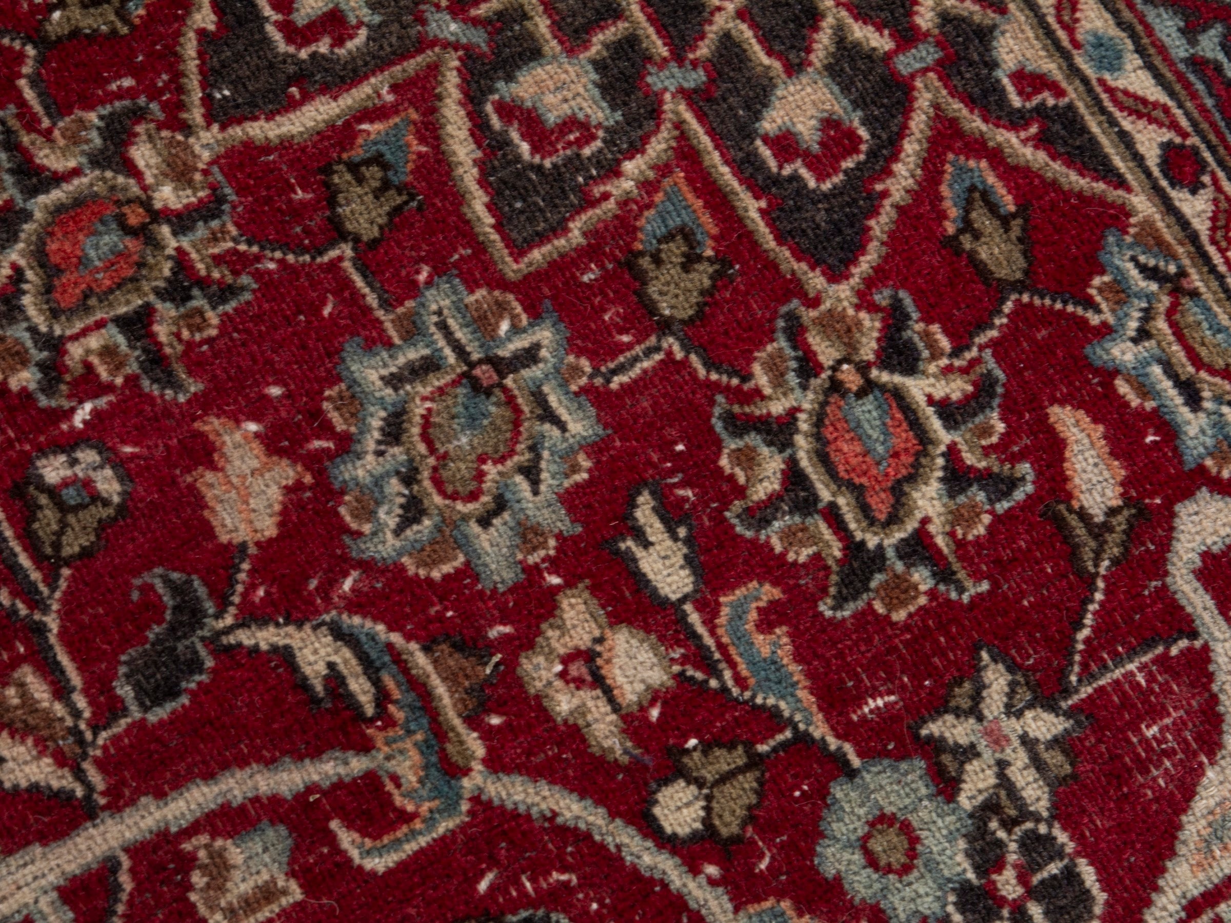 Persian Mashhad area rug in deep red and dark brown, view 15 of 19