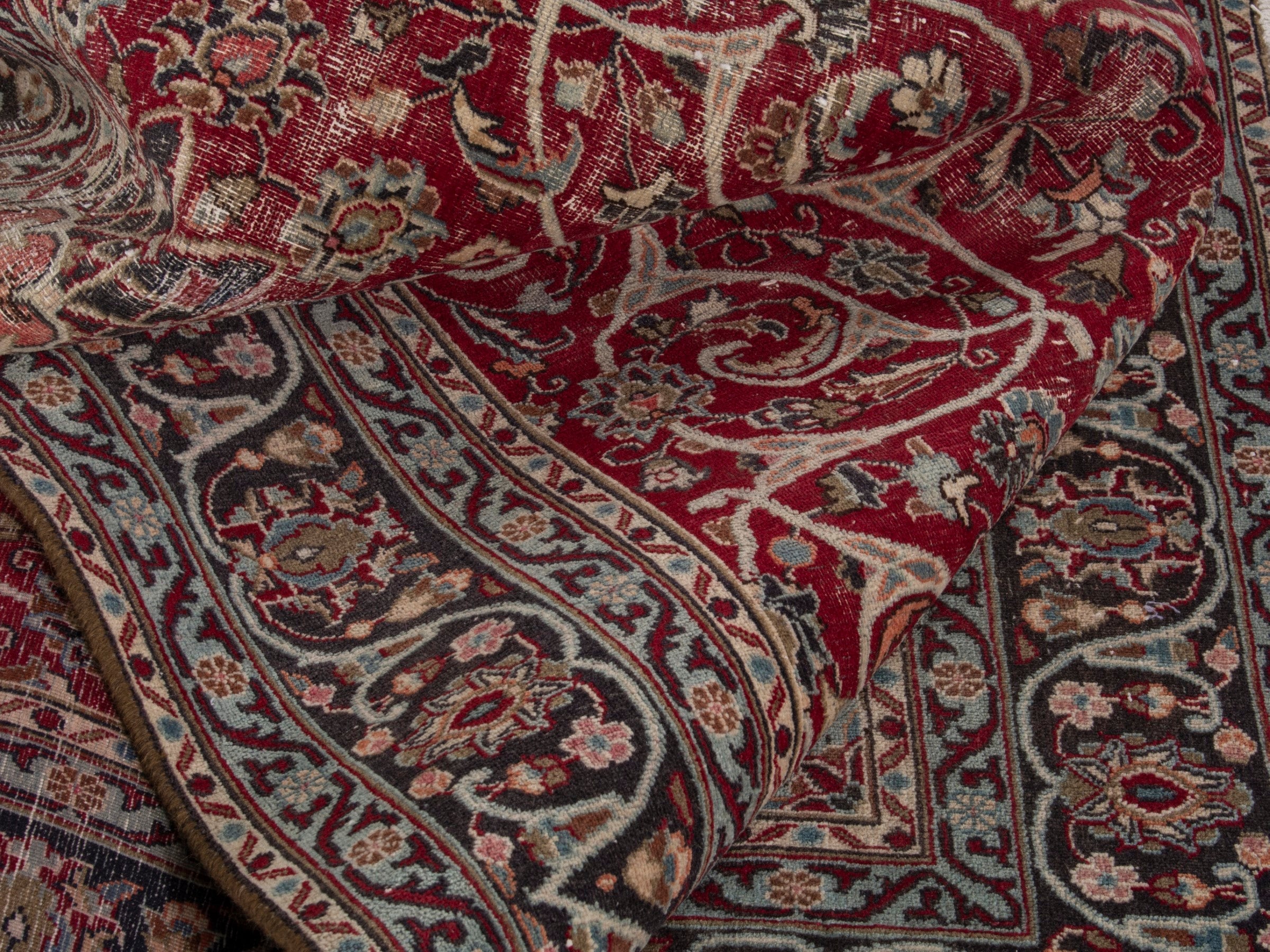 Persian Mashhad area rug in deep red and dark brown, view 16 of 19