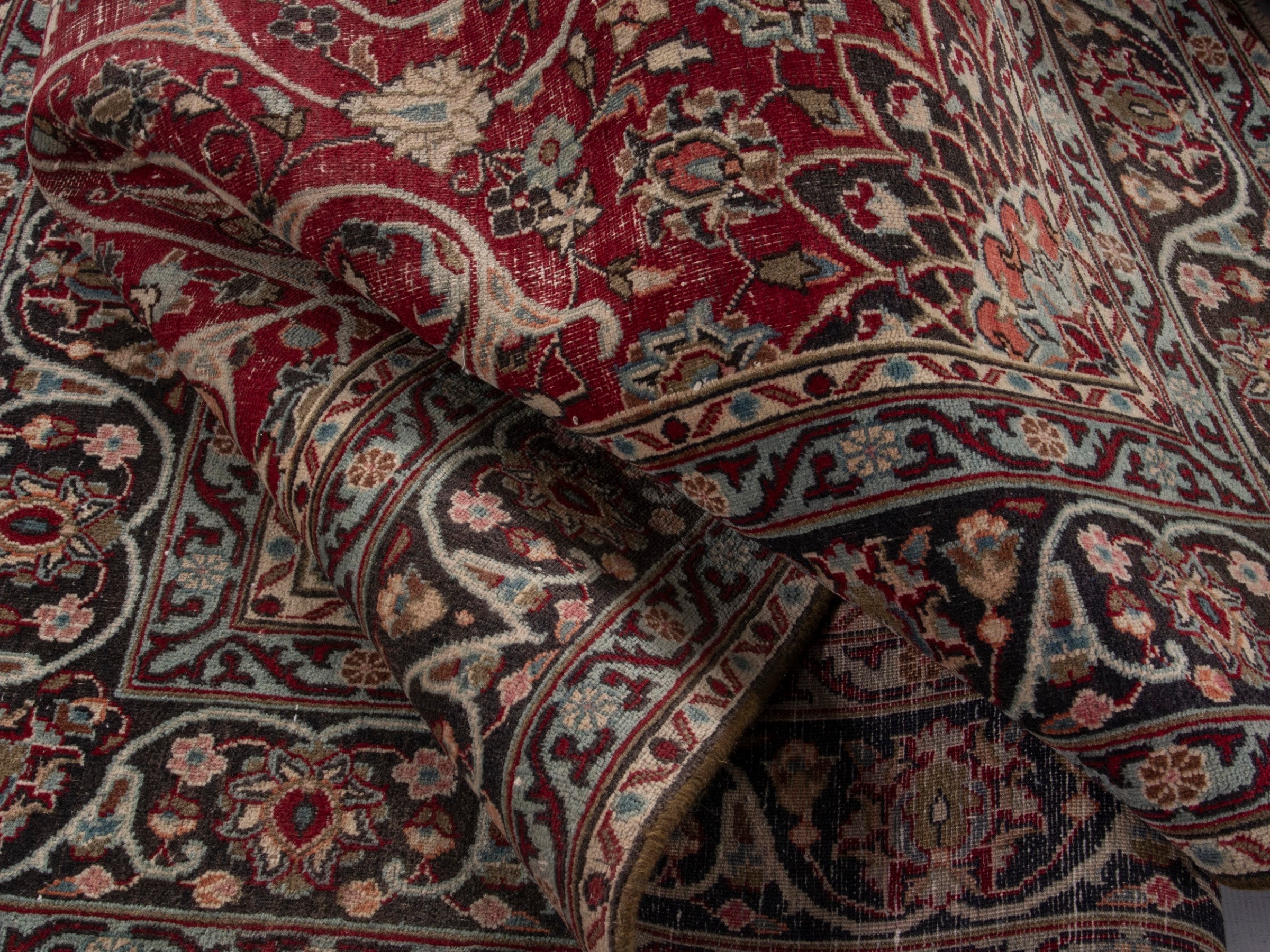 Persian Mashhad area rug in deep red and dark brown, view 17 of 19