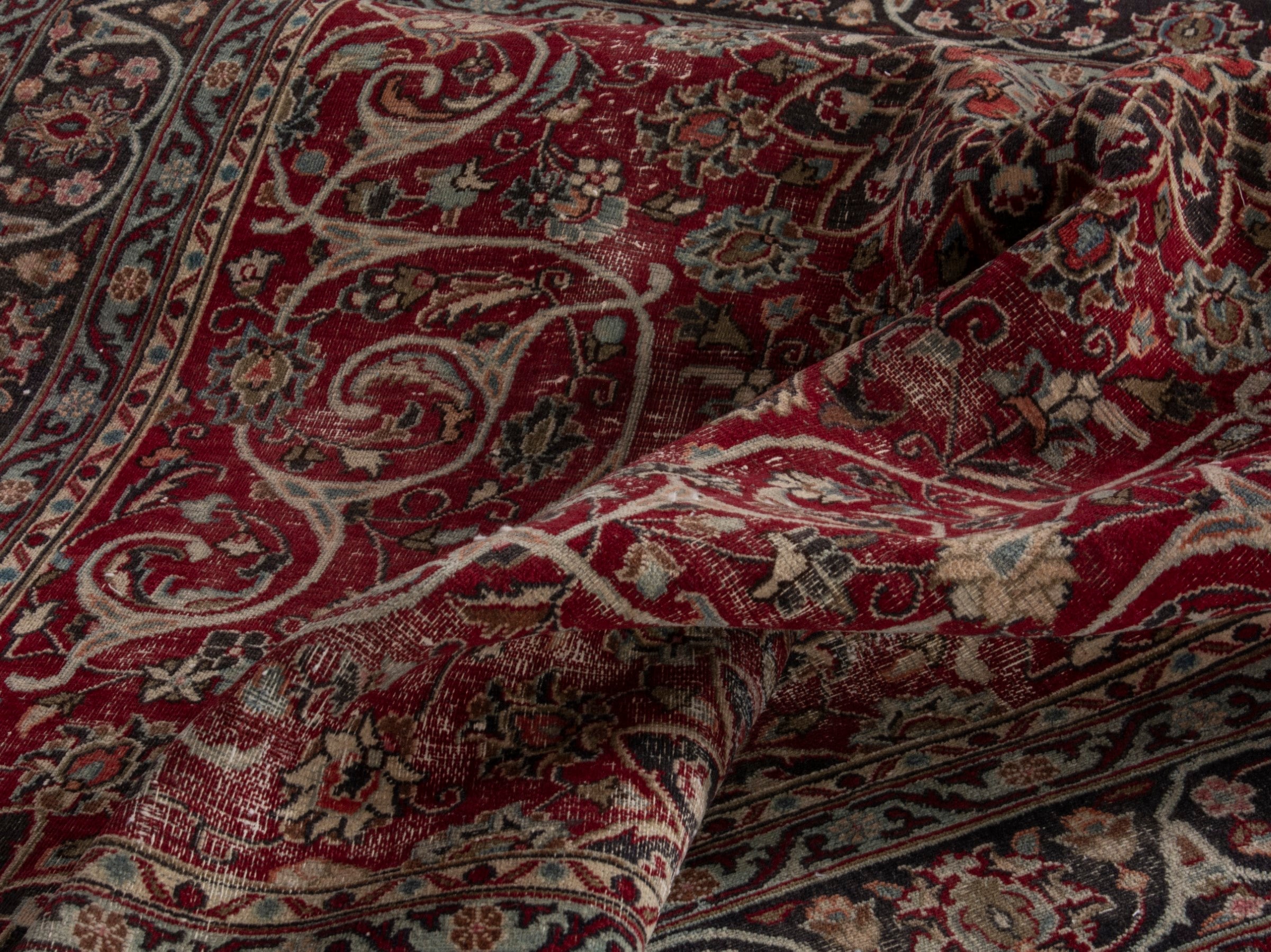 Persian Mashhad area rug in deep red and dark brown, view 18 of 19