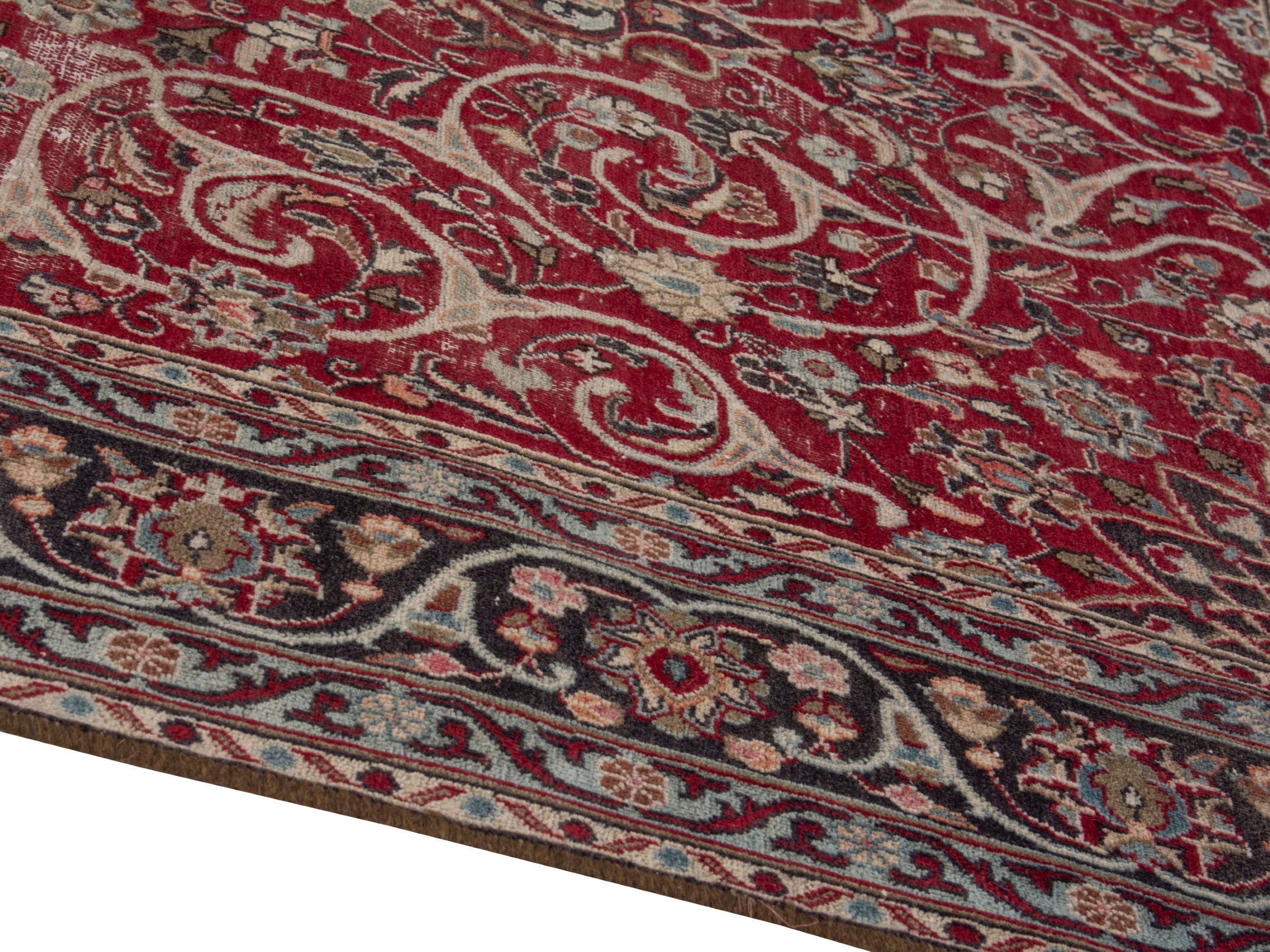Persian Mashhad area rug in deep red and dark brown, view 8 of 19