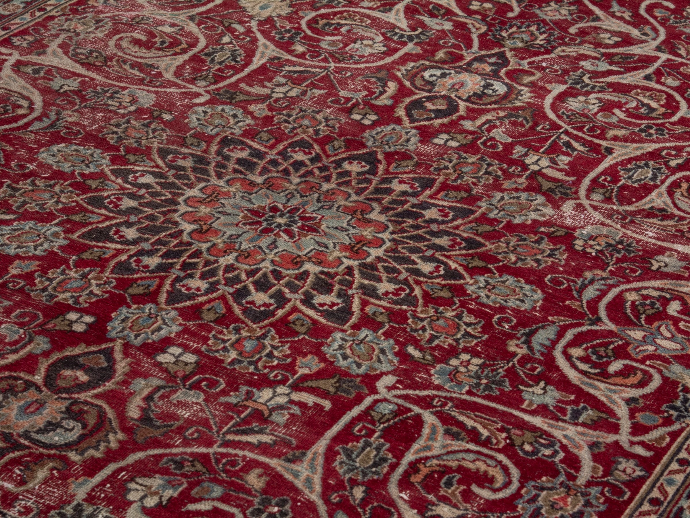 Persian Mashhad area rug in deep red and dark brown, view 9 of 19
