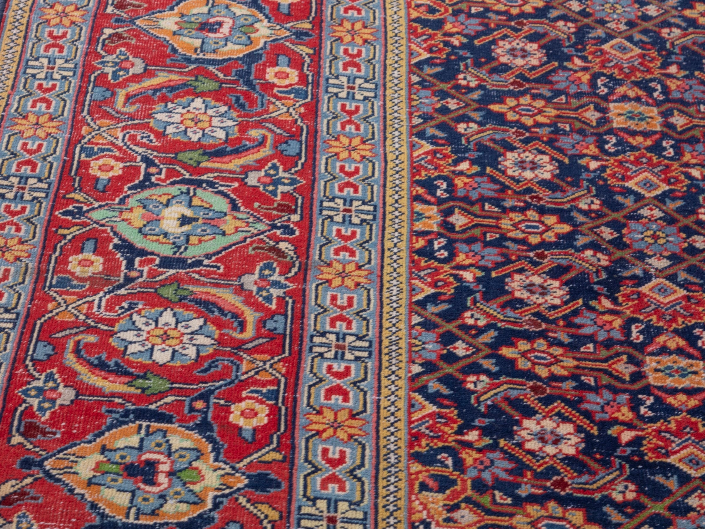Persian Mahal oversized rug in navy and deep red, view 7 of 21