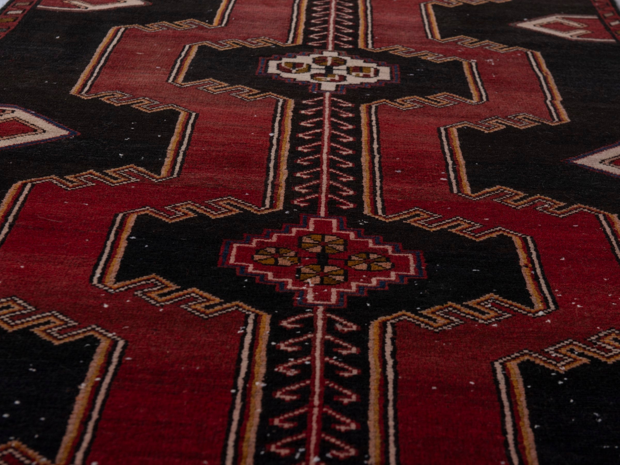 Persian Saveh runner rug in black and burgundy, view 11 of 20