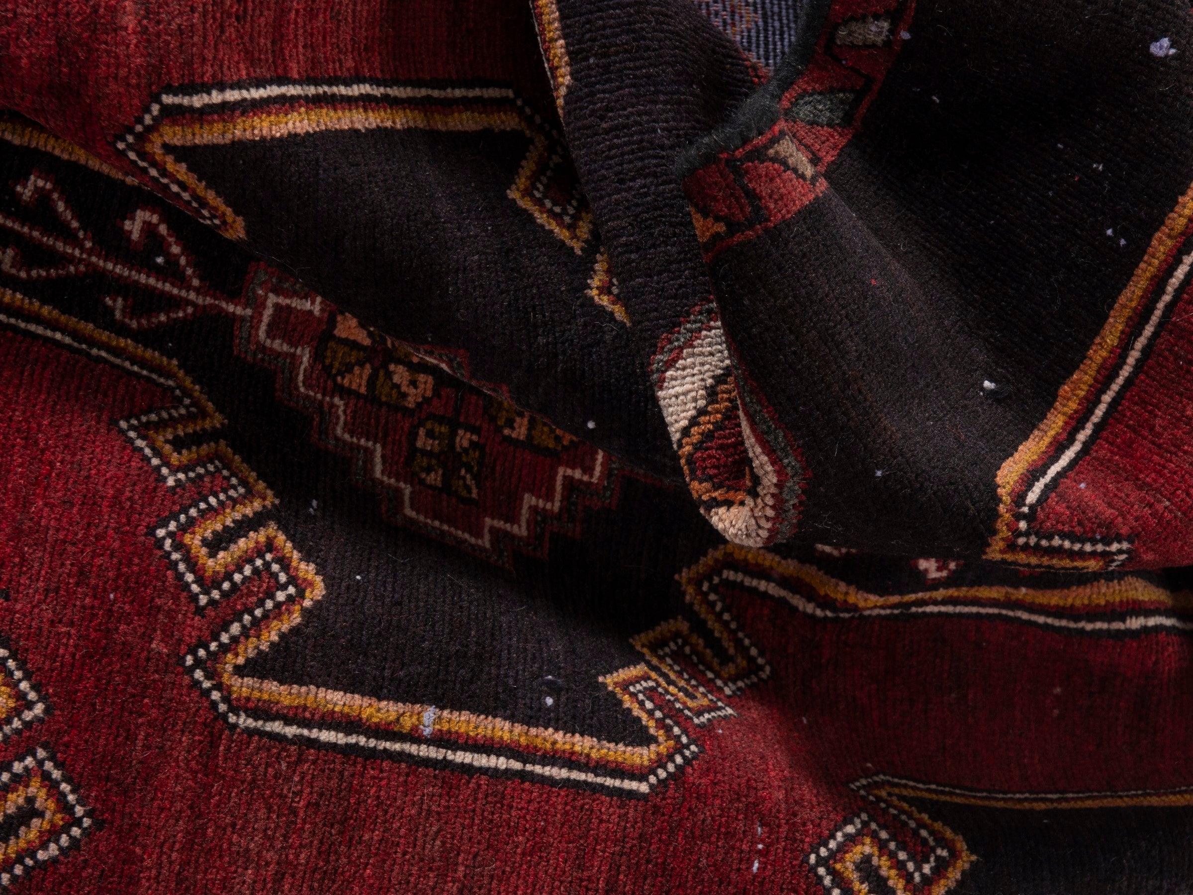 Persian Saveh runner rug in black and burgundy, view 19 of 20