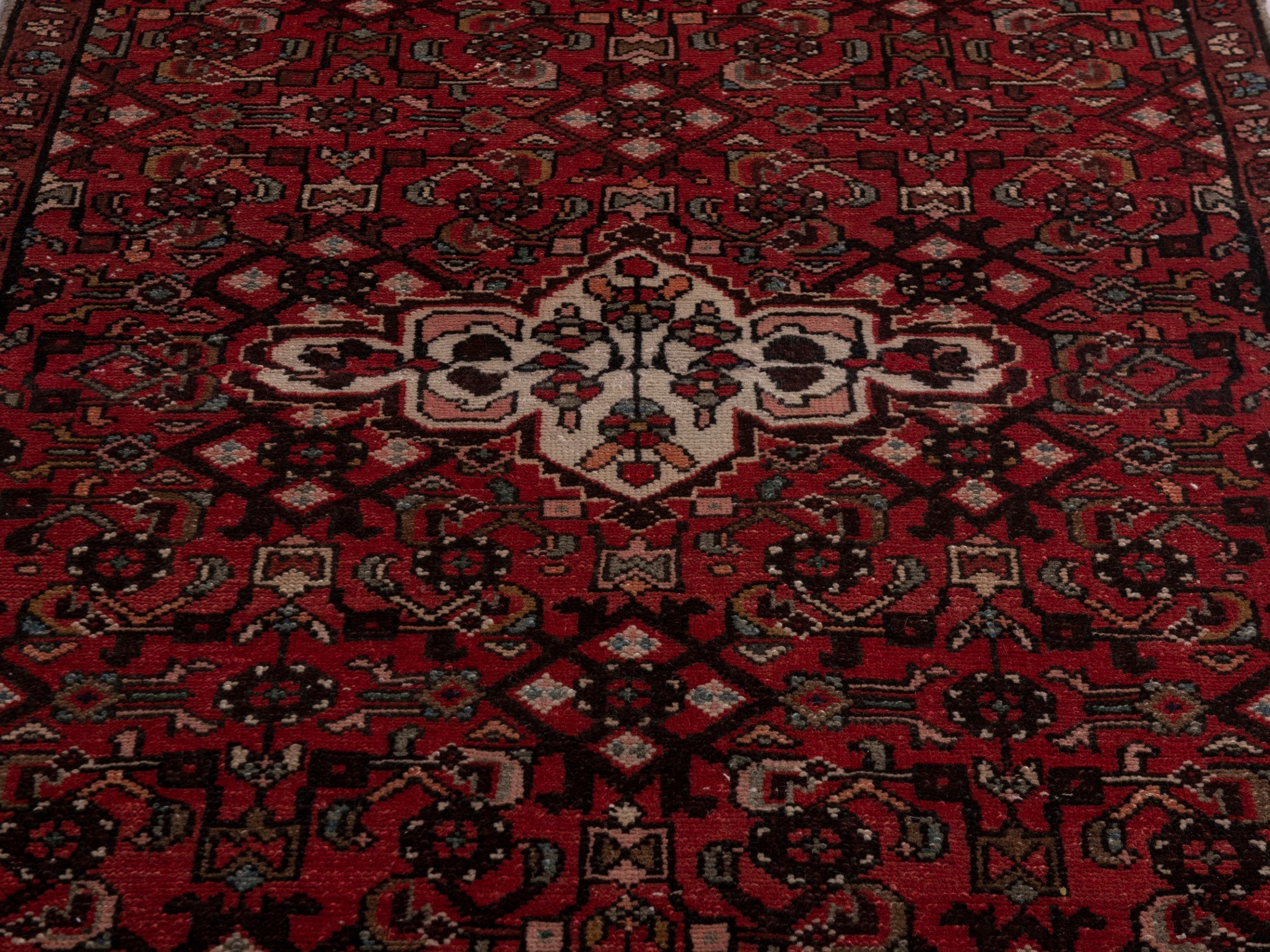 Persian Hamedan runner rug in deep red and off-white, view 9 of 18