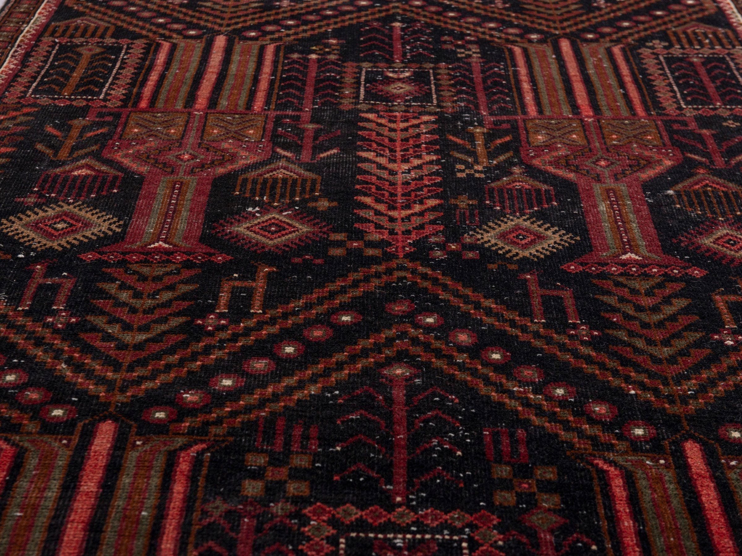 Persian Baluch runner rug in burgundy and deep red, view 11 of 21