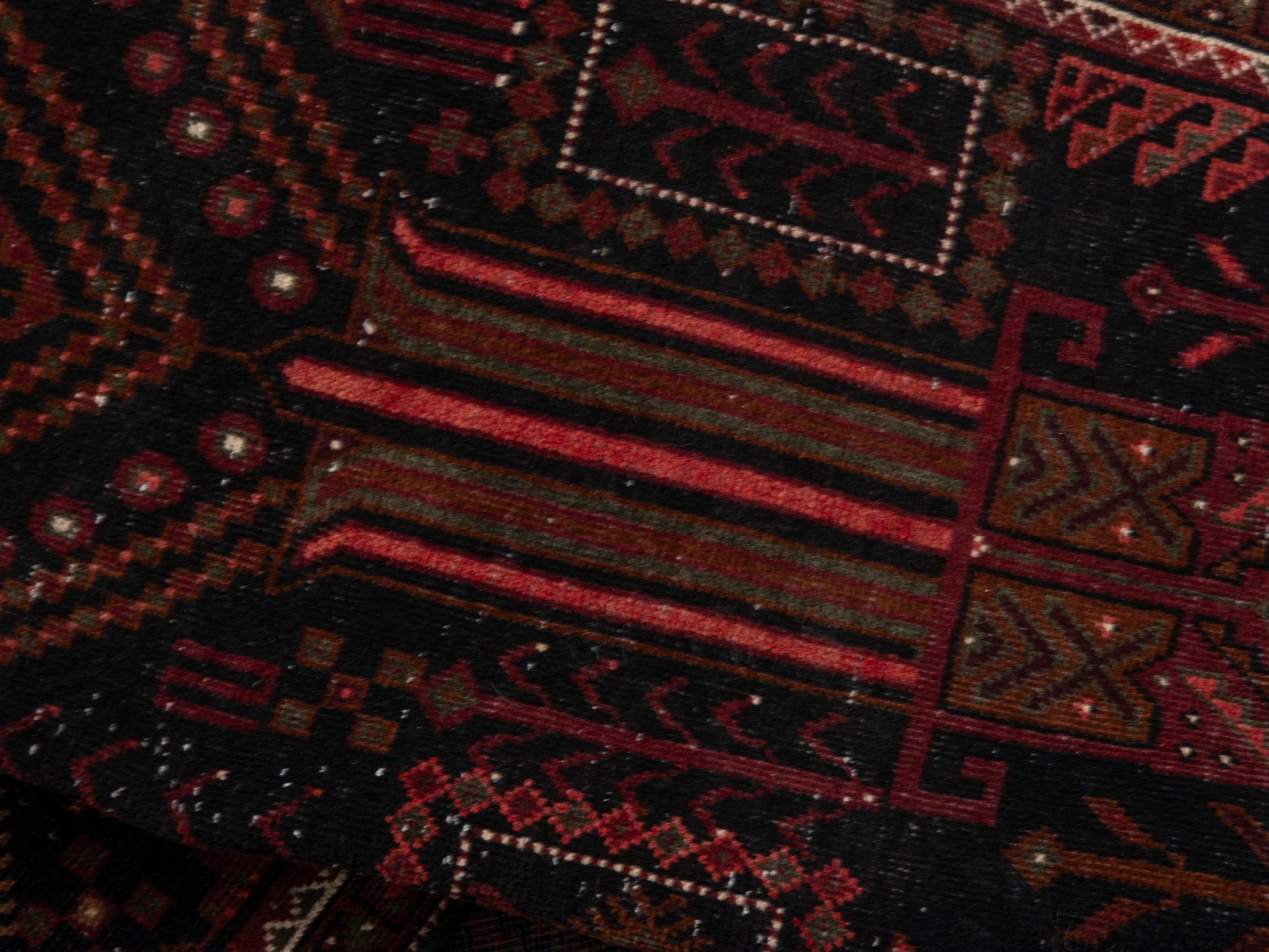 Persian Baluch runner rug in burgundy and deep red, view 18 of 21